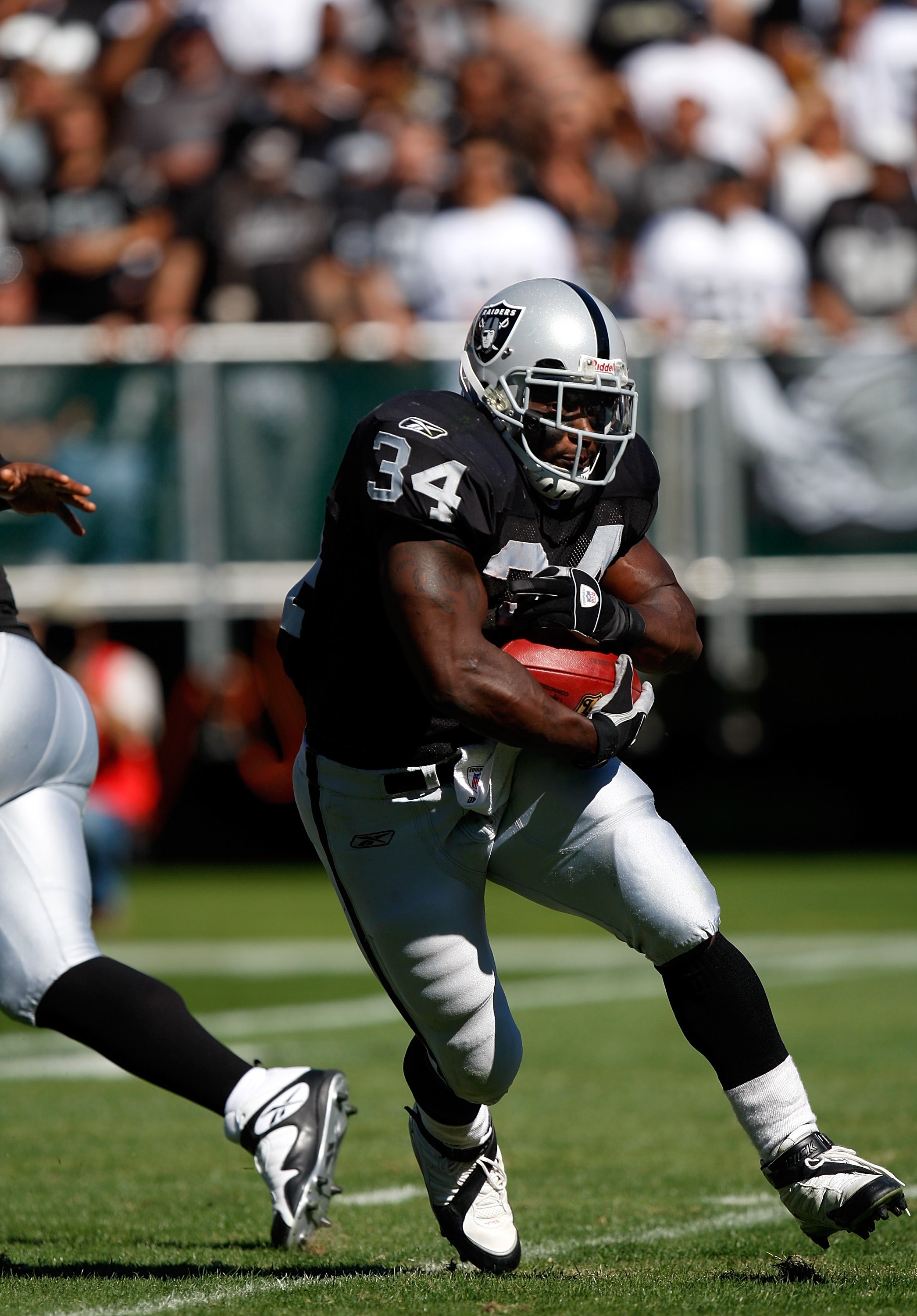 LaMont Jordan of the Oakland Raiders looks on before the game