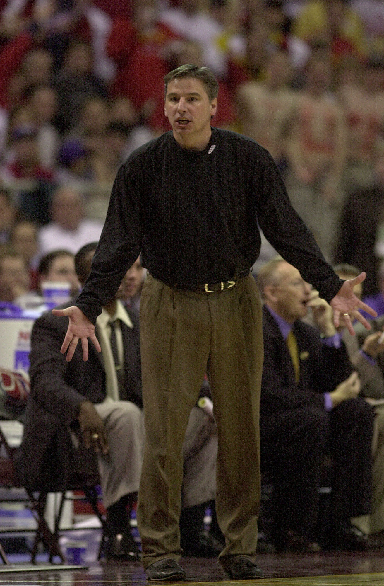 18 Mar 2000: Iowa St head coach Larry Eustachy directs his players during the game against Auburn during the Second Round of the NCAA Midwest Regional at the Hubert H. Humphrey Metrodome in Minneapolis, Minnesota. Iowa State won 79-60. DIGITAL IMAGE.