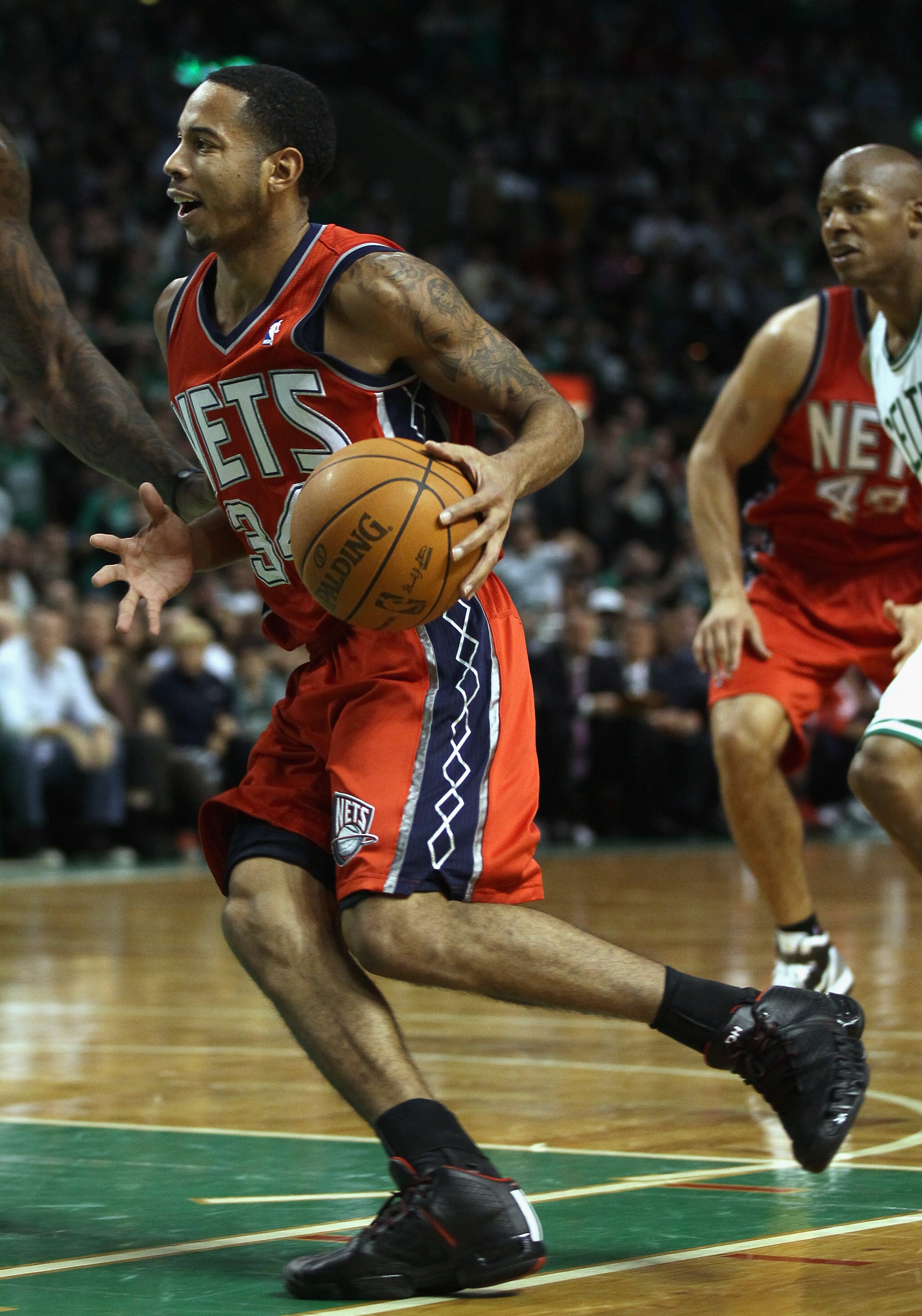BOSTON - NOVEMBER 24:  Devin Harris #34 of the New Jersey Nets heads for the net in the second half against the Boston Celtics on November 24, 2010 at the TD Garden in Boston, Massachusetts. The Celtics defeated the nets 89-83. NOTE TO USER: User expressl