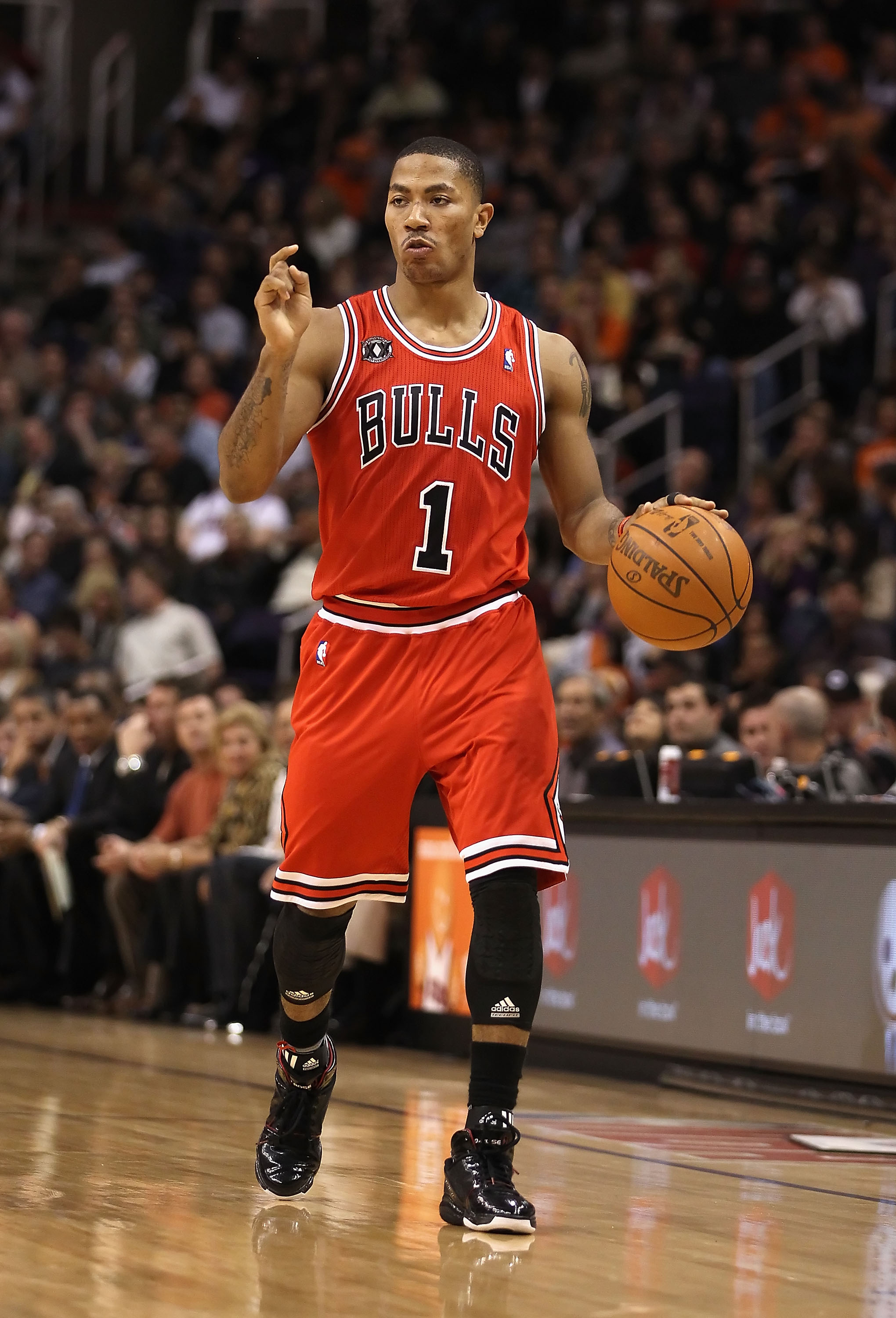 PHOENIX - NOVEMBER 24:  Derrick Rose #1 of the Chicago Bulls handles the ball during the NBA game against the Phoenix Suns at US Airways Center on November 24, 2010 in Phoenix, Arizona. The Bulls defeated the Suns 123-115 in double overtime. NOTE TO USER: