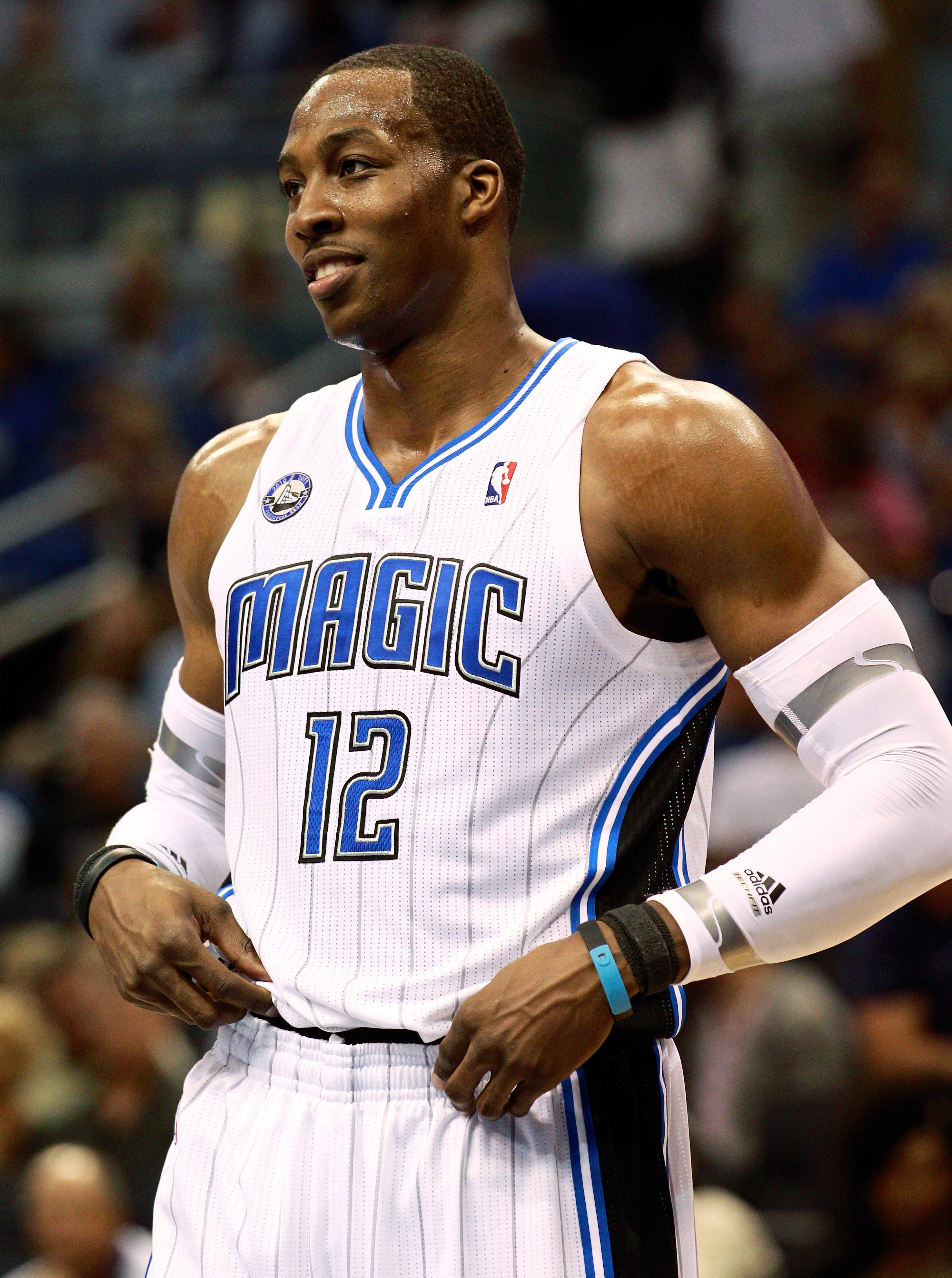 ORLANDO, FL - OCTOBER 10:  Dwight Howard #12 of the Orlando Magic smiles during the game against the New Orleans Hornets at Amway Arena on October 10, 2010 in Orlando, Florida. NOTE TO USER: User expressly acknowledges and agrees that, by downloading and