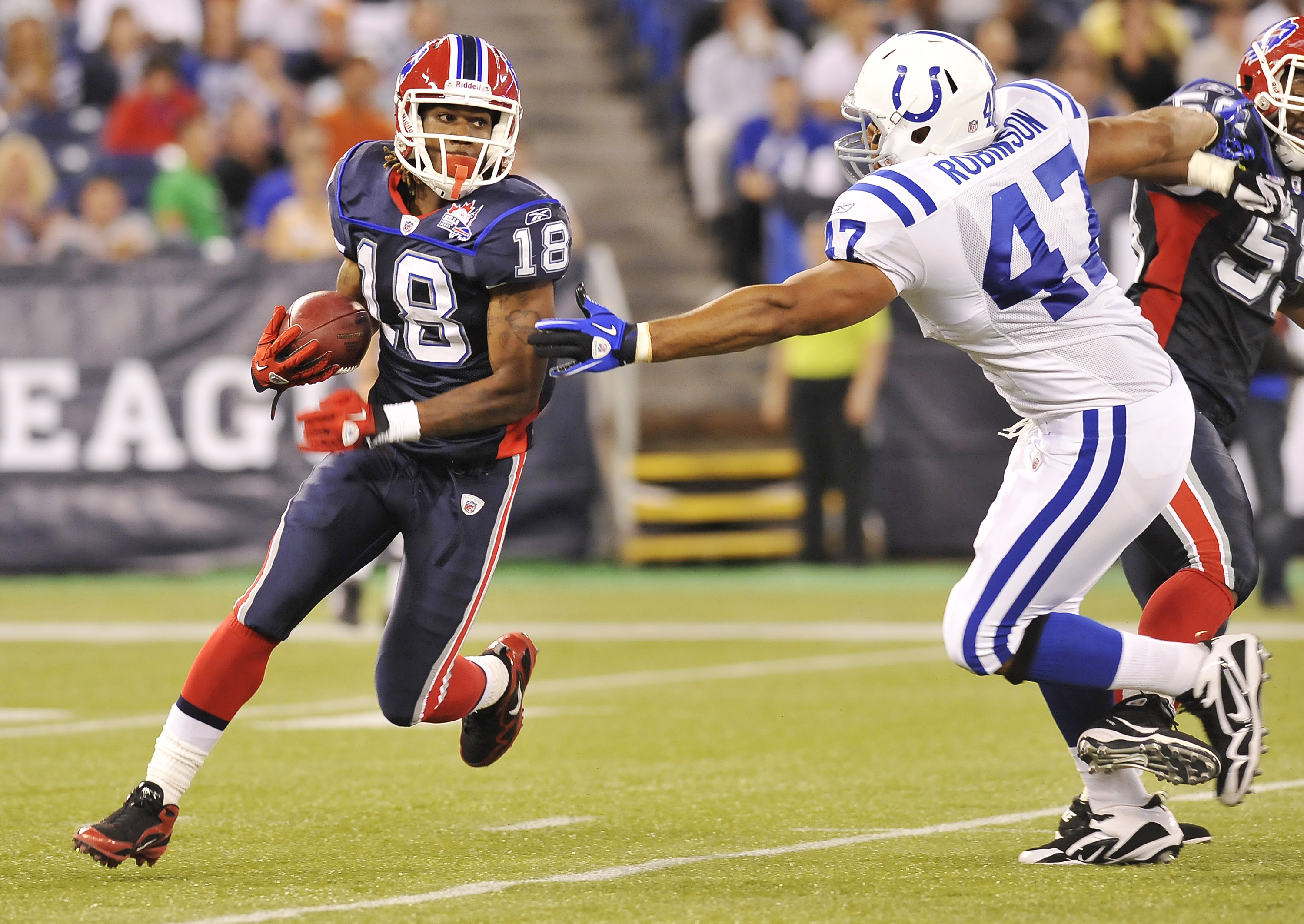 18 November 2007: Buffalo Bills wide receiver Roscoe Parrish (11)  celebrates his 47-yard touchdown reception with wide receiver Lee Evans  (83) during the first quarter against the New England Patriots at Ralph