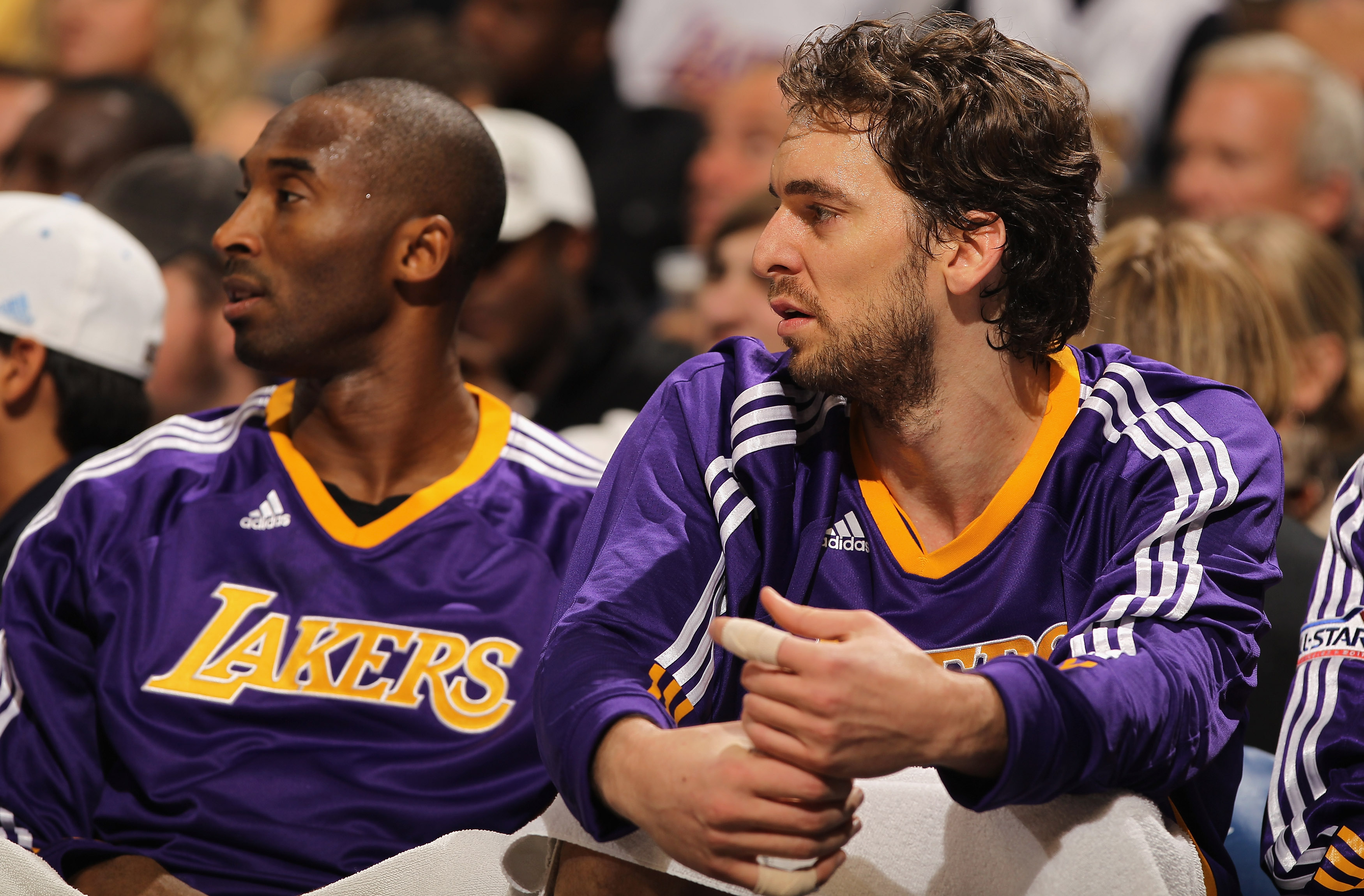 DENVER - NOVEMBER 11:  Kobe Bryant #24 and Pau Gasol #16 of the Los Angeles Lakers look on from the bench against the Denver Nuggets at the Pepsi Center on November 11, 2010 in Denver, Colorado. The Nuggets defeated the Lakers 118-112.  NOTE TO USER: User