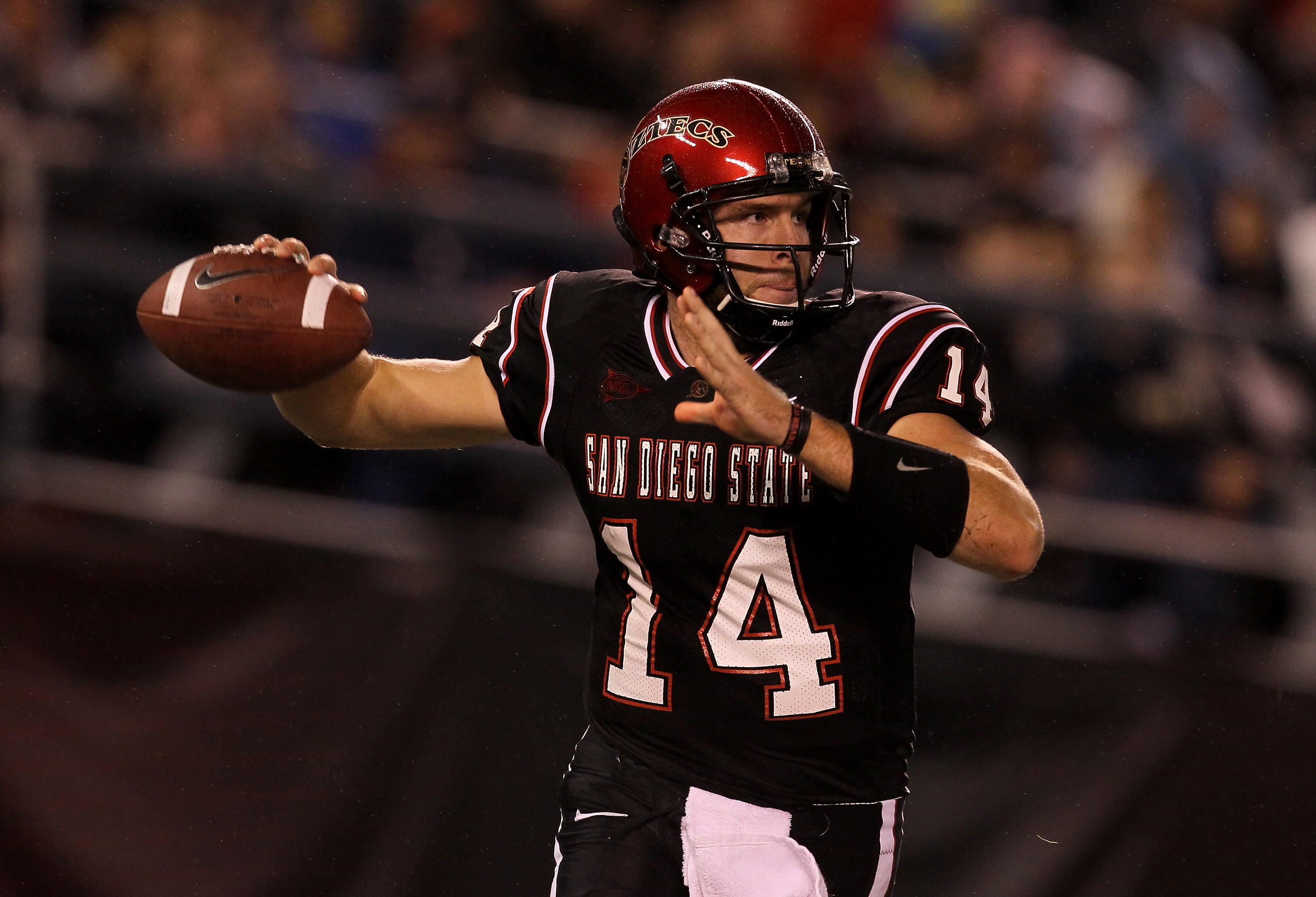SAN DIEGO - NOVEMBER 20:  Quarterback Ryan Lindley #14 of the San Diego State Aztecs throws a pass against the Utah Utes at Qualcomm Stadium on November 20, 2010 in San Diego, California.  Utah won 38-34.  (Photo by Stephen Dunn/Getty Images)