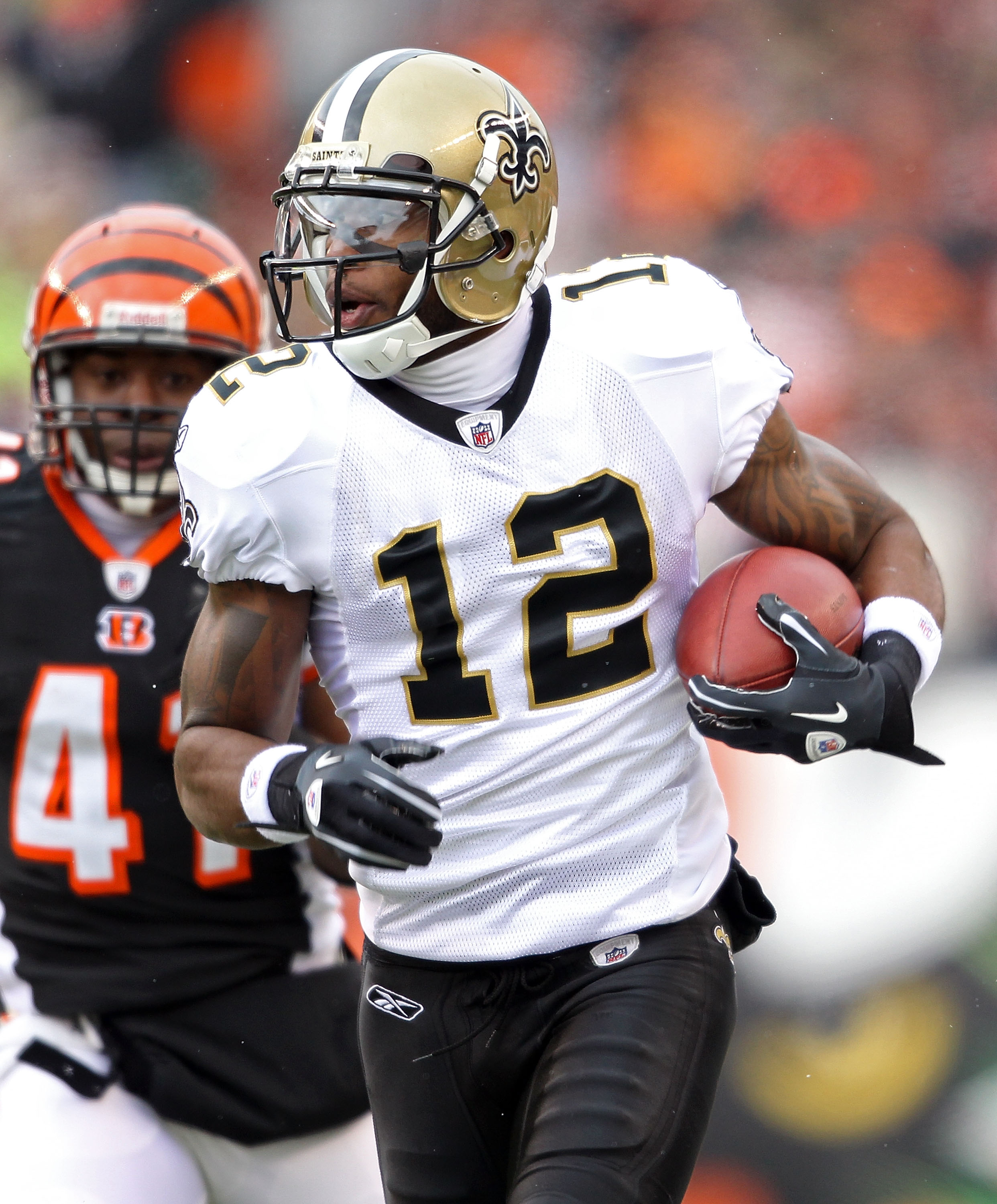 2008 August 16: Houston Texans defensive end Mario Williams looks up at the  instant replay after New Orleans Saints receiver Marques Colston scored on  a one-handed 5-yard touchdown catch in the second