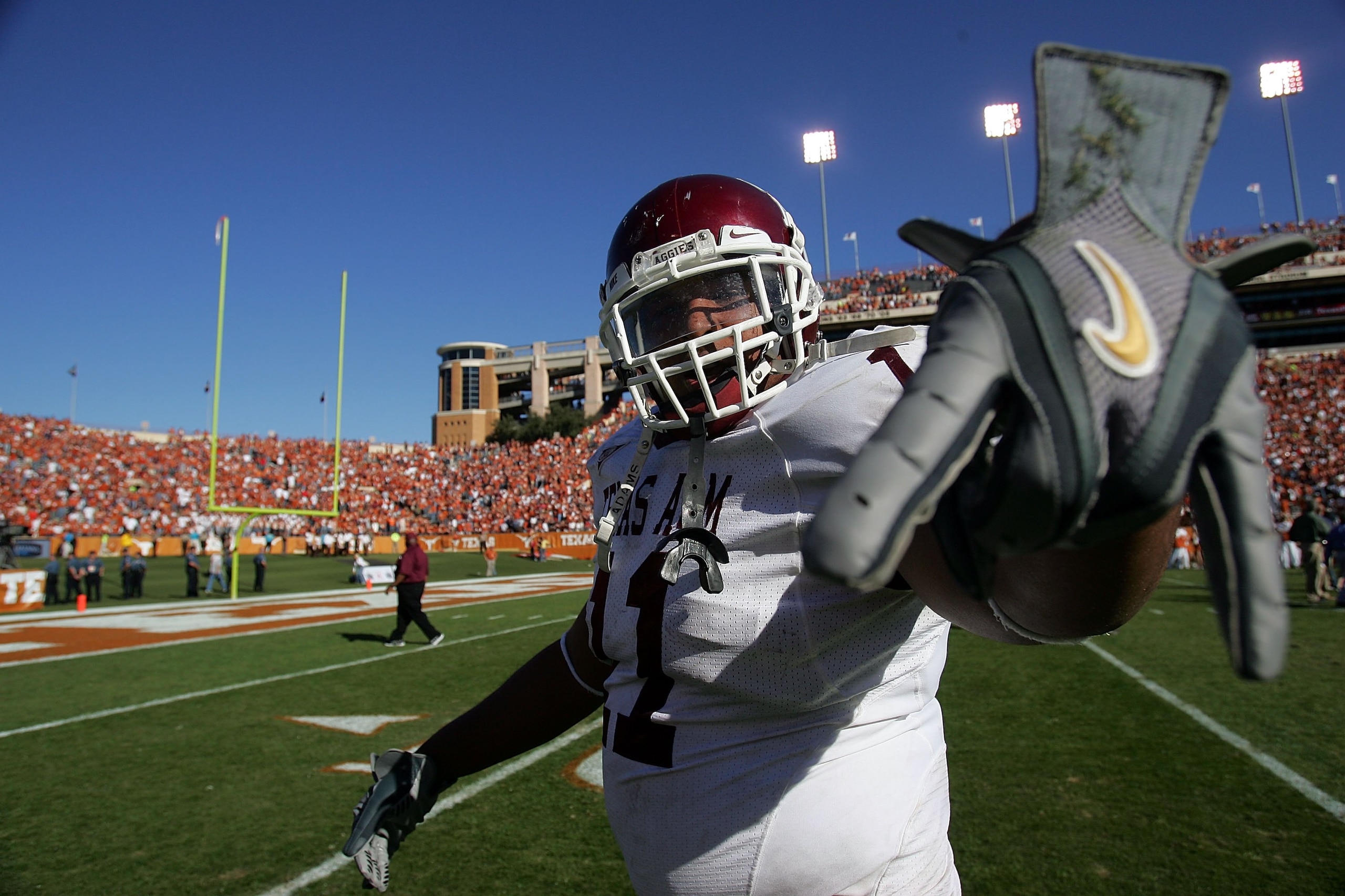 AUSTIN, TX - NOVEMBER 24: Running back Jorvorskie Lane #11 of the Texas A&M Aggies gives an upside down hook em horns sign while celebrating a 12-7 win against the Texas Longhorns at Darrell K Royal-Texas Memorial Stadium November 24, 2006 in Austin, Tex AUSTIN, TX - NOVEMBER 24: Running back Jorvorskie Lane #11 of the Texas A&M Aggies gives an upside down hook em horns sign while celebrating a 12-7 win against the Texas Longhorns at Darrell K Royal-Texas Memorial Stadium November 24, 2006 in Austin, Tex