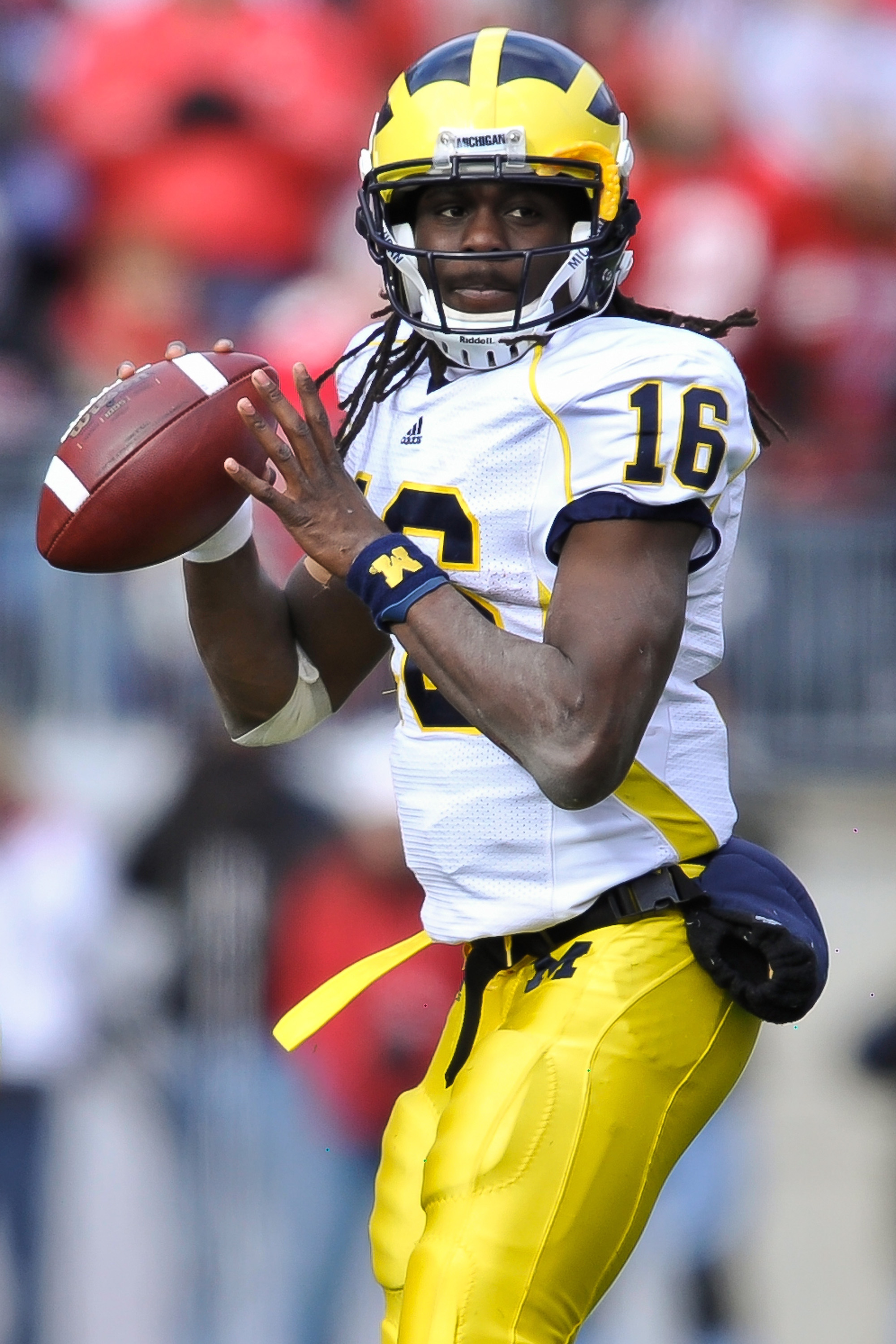 COLUMBUS, OH - NOVEMBER 27:  Quarterback Denard Robinson #16 of the Michigan Wolverines drops back to pass against the Ohio State Buckeyes at Ohio Stadium on November 27, 2010 in Columbus, Ohio.  (Photo by Jamie Sabau/Getty Images)