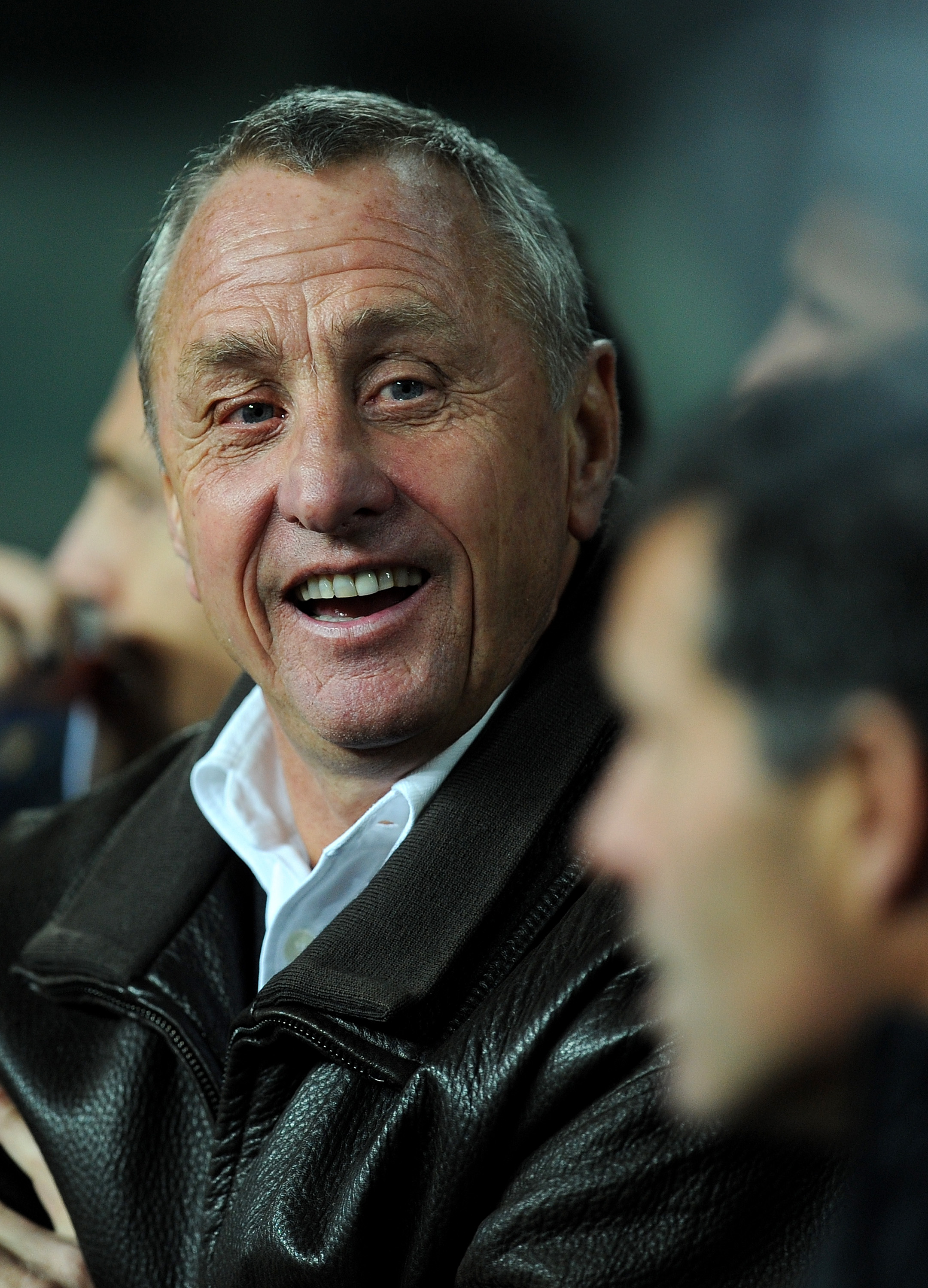 BARCELONA, SPAIN - DECEMBER 22:  Head coach Johan Cruyff of Catalunya smiles during the international friendly match between Catalunya and Argentina at the Camp Nou stadium on December 22, 2009 in Barcelona, Spain. Catalunya won the match 4-2.  (Photo by