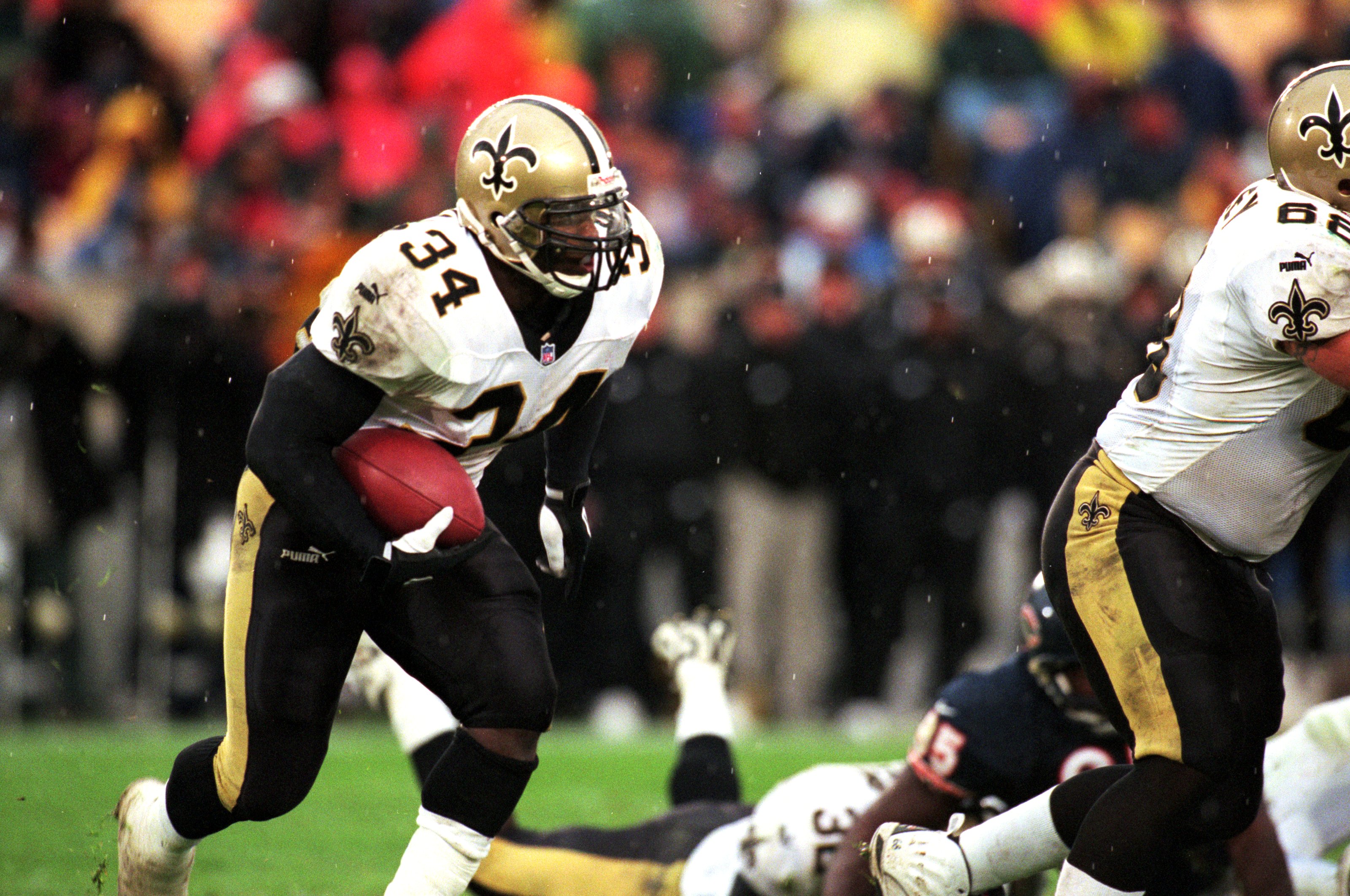 3 Oct 1999:  Ricky Williams #24 of the New Orleans Saints runs with the ball during the game against the Chicago Bears at Soldier Field in Chicago, Illinois. The Bears defeated the Saints 14-10. Mandatory Credit: Jonathan Daniel  /Allsport