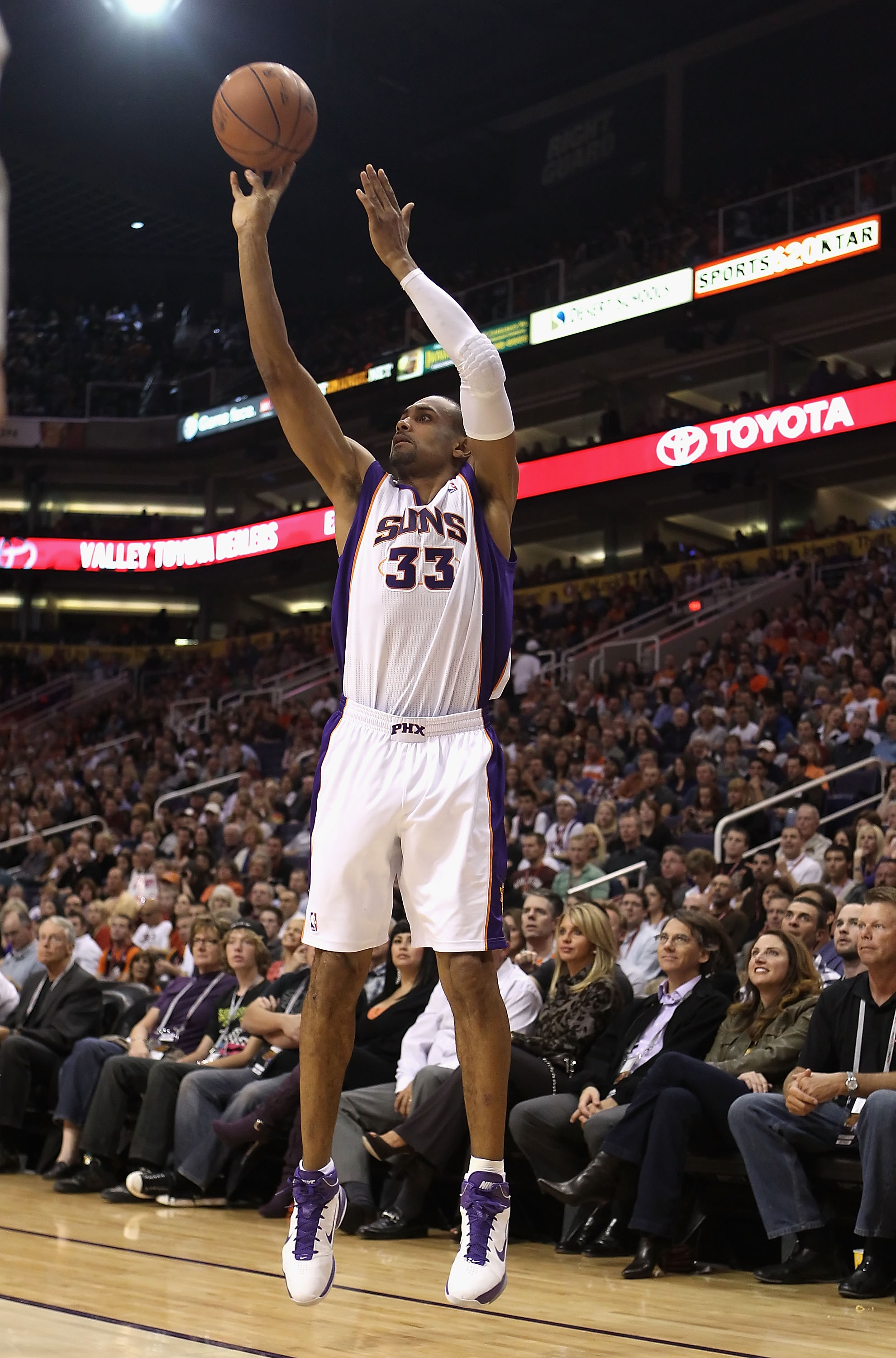 PHOENIX - DECEMBER 10: Grant Hill #33 of the Phoenix Suns puts up a shot during the NBA game against the Portland Trail Blazers at US Airways Center on December 10, 2010 in Phoenix, Arizona. The Trail Blazers defeated the Suns 101-94. NOTE TO USER: User