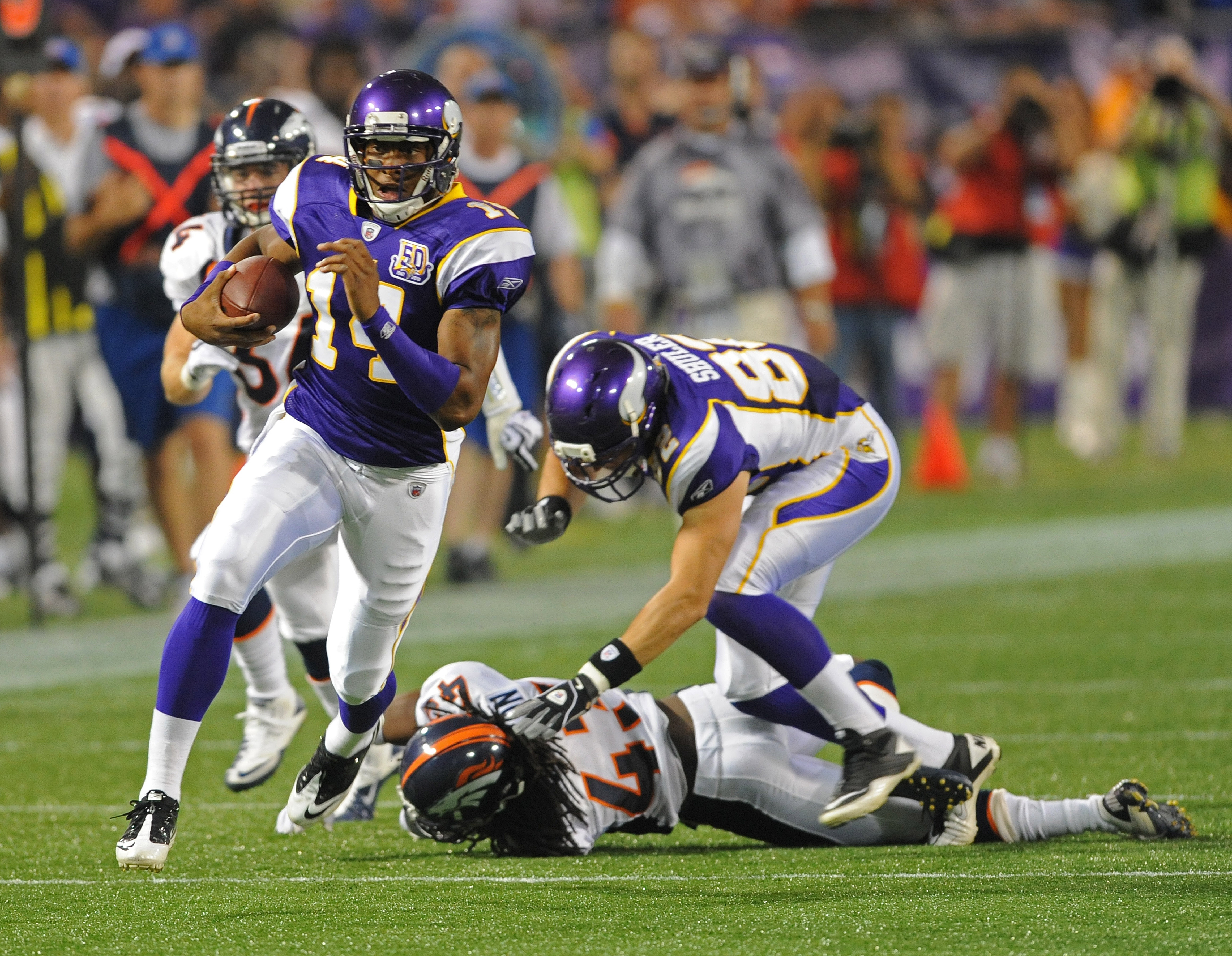 Quarterback Joe Webb of the Minnesota Vikings runs the ball against