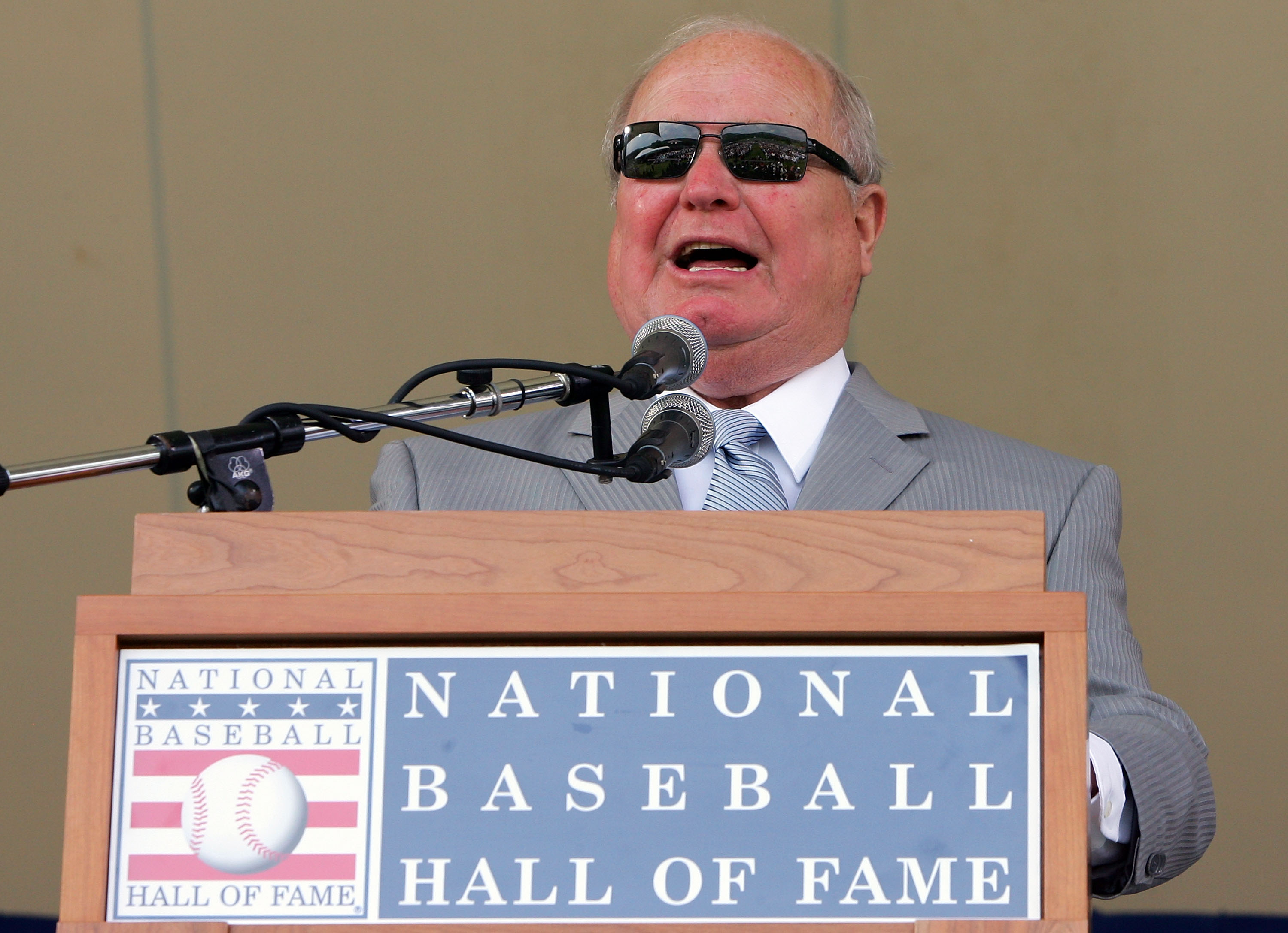 COOPERSTOWN, NY - JULY 27:  Dave Niehaus gives a speech after accepting the Ford C. Frick award for excellence in broadcasting at Clark Sports Center during the Baseball Hall of Fame induction ceremony on July 27, 2008 in Cooperstown, New York.  (Photo by