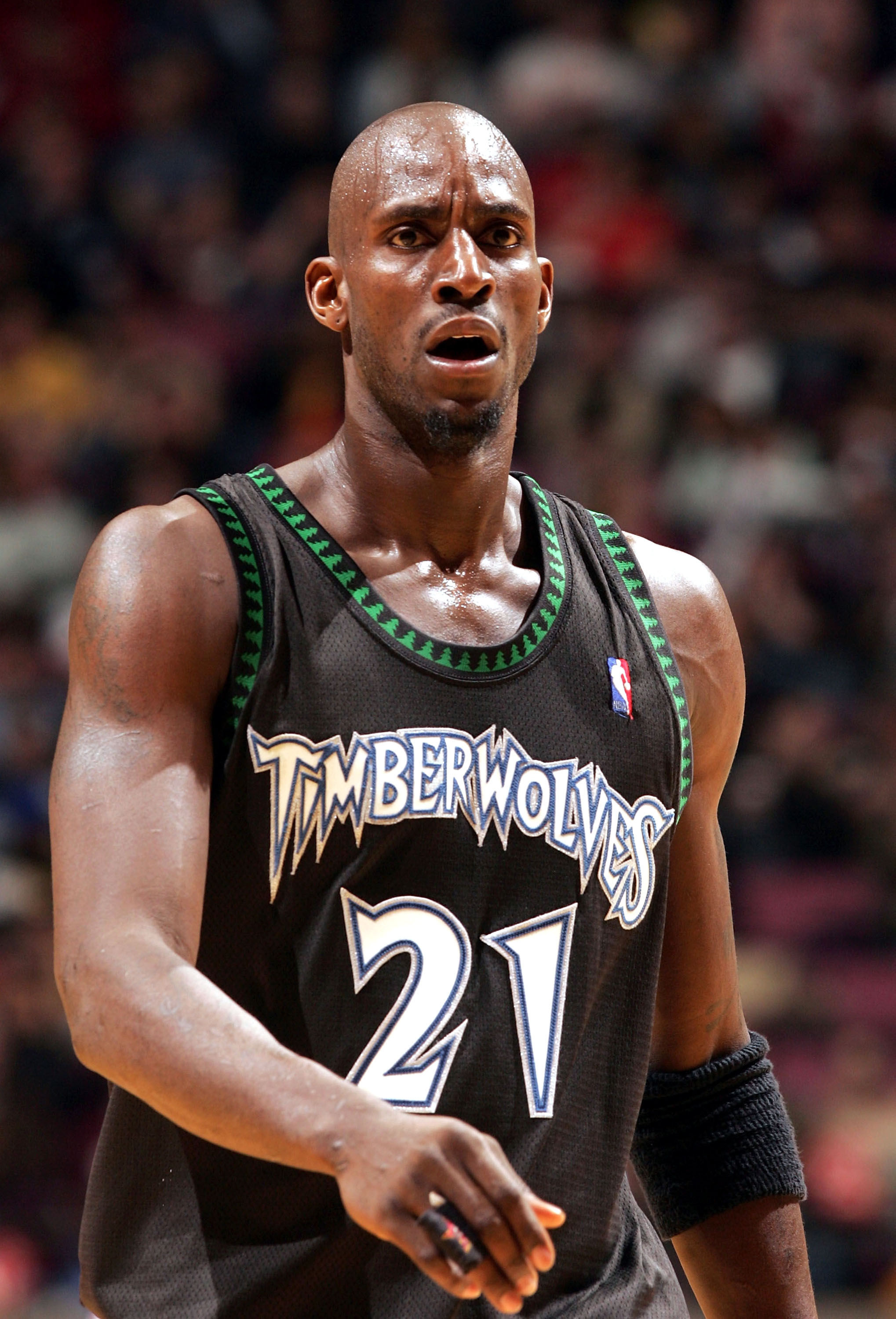 EAST RUTHERFORD , NJ - MARCH 26:  Kevin Garnett #21 of the Minnesota Timberwolves looks on during their game against the New Jersey Nets on March 26, 2005 at Continental Airlines Arena in East Rutherford, New Jersey.  NOTE TO USER:  User expressly acknowl