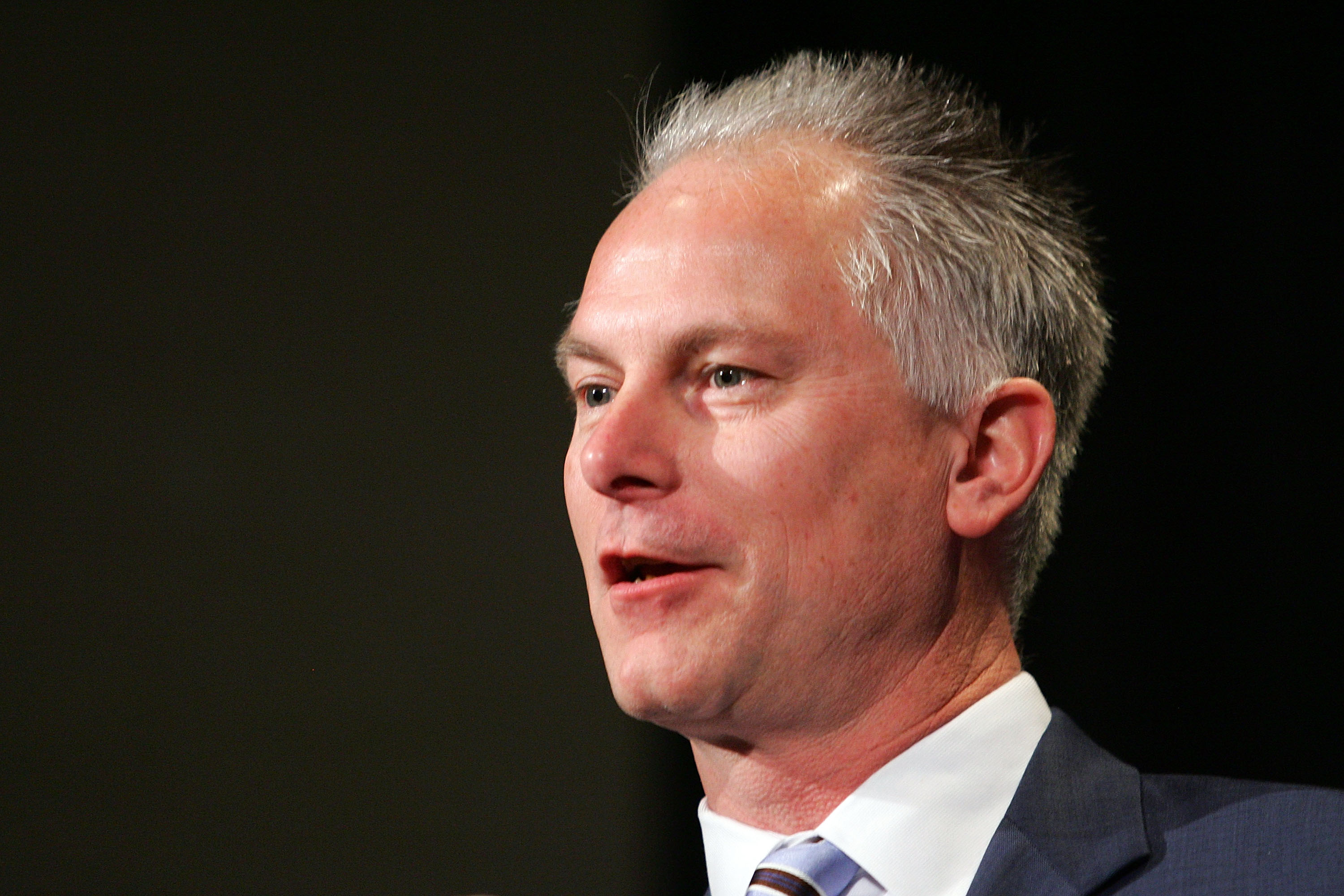 PHOENIX - JANUARY 31:  Kenny Mayne of ESPN asks a question during the GMC Defensive Player of the Year award news conference prior to Super Bowl XLII at the Phoenix Convention Center on January 31, 2008 in Phoenix, Arizona.  (Photo by Streeter Lecka/Getty