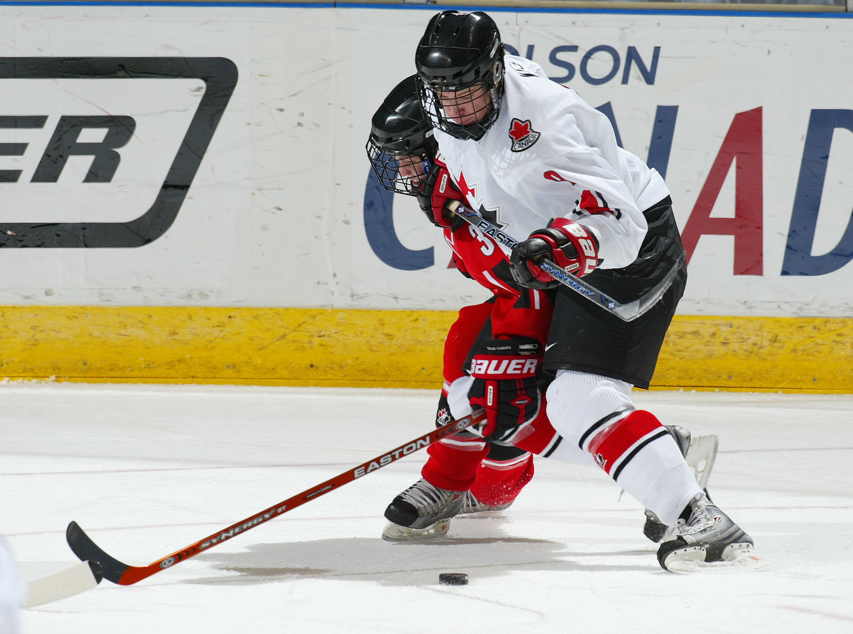 LONDON,ON - JANUARY 3: Carter Ashton #9 of Team Ontario tries to muscle his way past Ryan Ellis #3 of Team Ontario in a game on January 3, 2008 at the John Labatt Centre in London, Ontario. Team Ontario defeated Team West 4-3 to earn a spot in the gold m