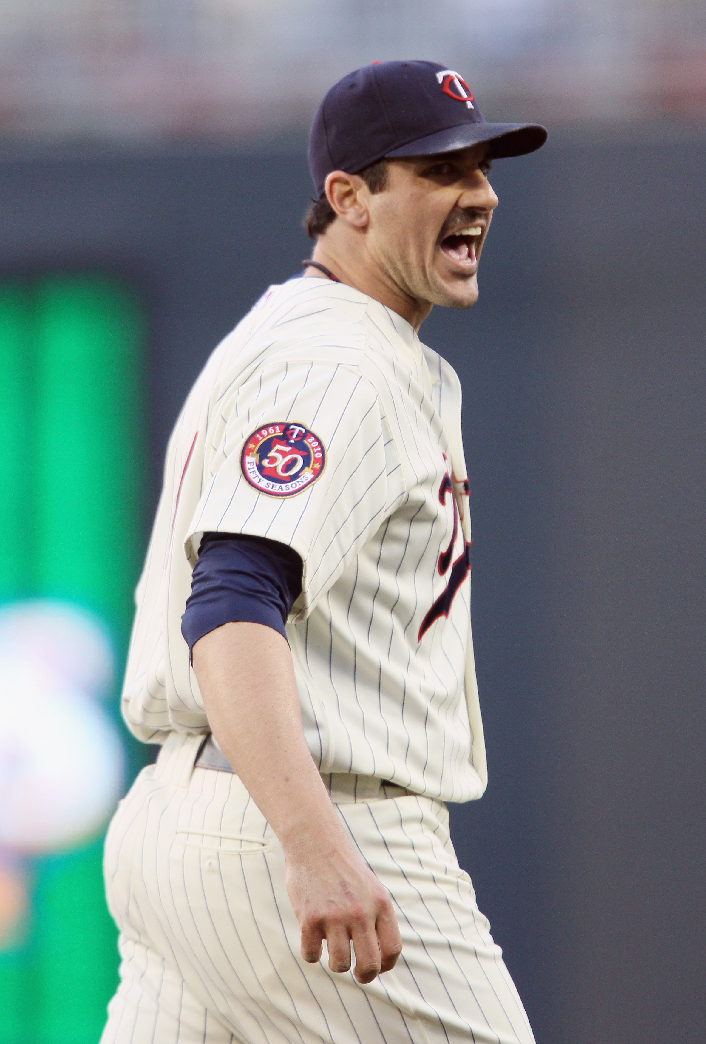 MINNEAPOLIS - OCTOBER 07:  Carl Pavano #48 of the Minnesota Twins celebrates after the third out in the first inning against the New York Yankees during game two of the ALDS on October 7, 2010 at Target Field in Minneapolis, Minnesota.  (Photo by Elsa/Get