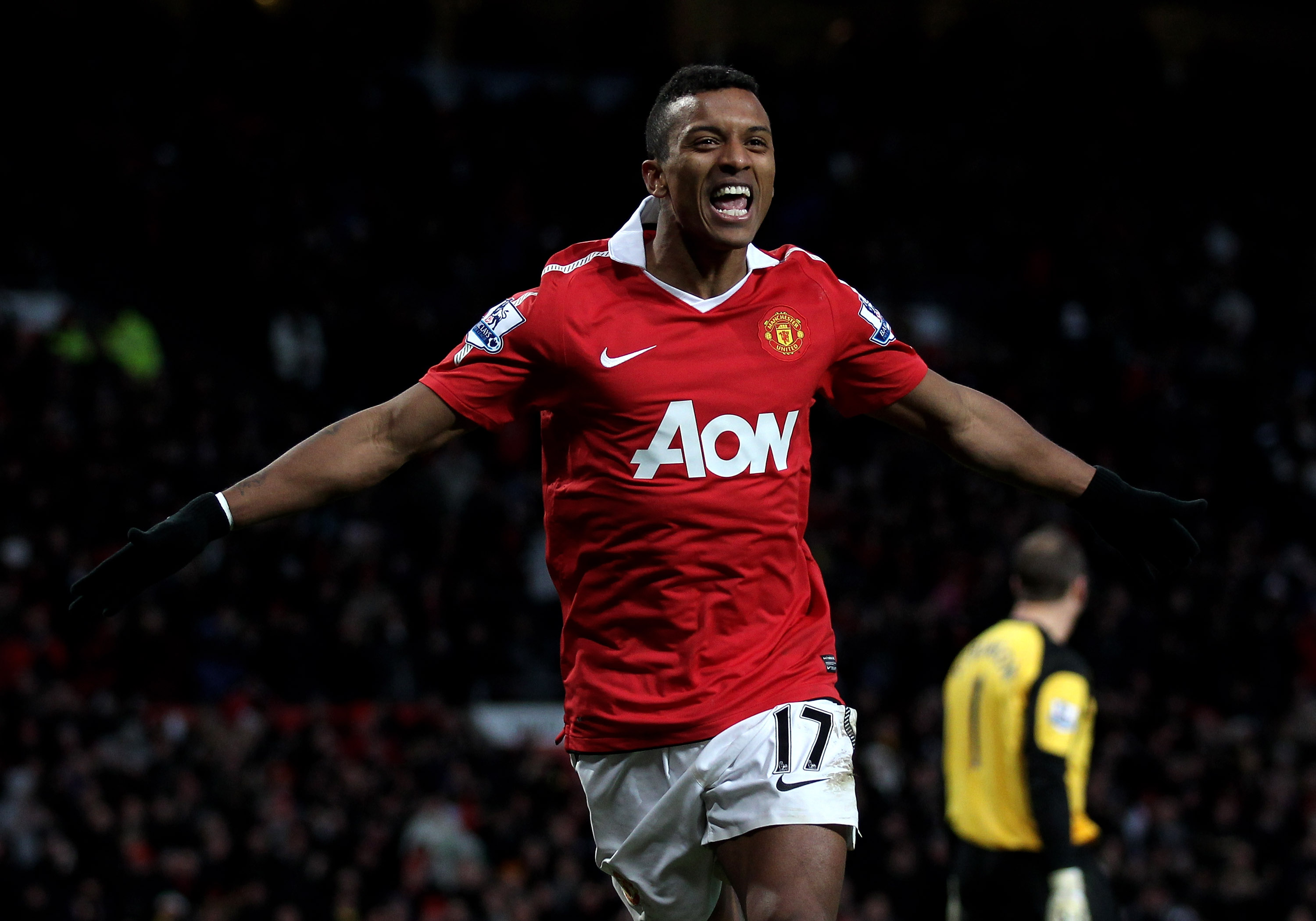 MANCHESTER, ENGLAND - NOVEMBER 27:  Nani of Manchester United celebrates scoring his team's fifth goal during the Barclays Premier League match between Manchester United and Blackburn Rovers at Old Trafford on November 27, 2010 in Manchester, England.  (P