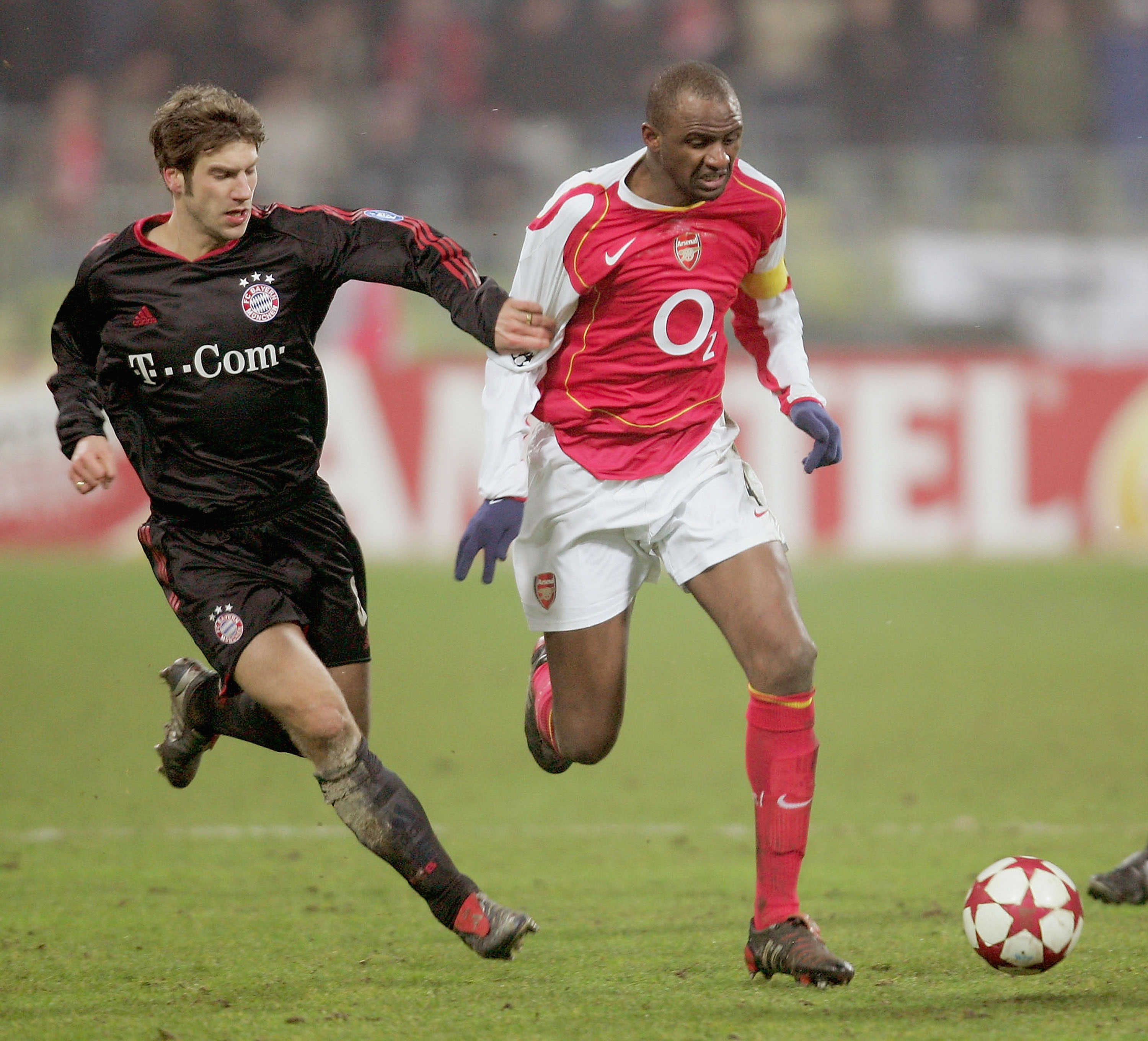 MUNICH, GERMANY - FEBRUARY 22:  Torsten Frings of Munich battles with Patrick Vieira of Arsenal during the Champions League second round, first leg match between Bayern Munich and Arsenal at the Olympic Stadium on February 22, 2005 in Munich, Germany.  (P