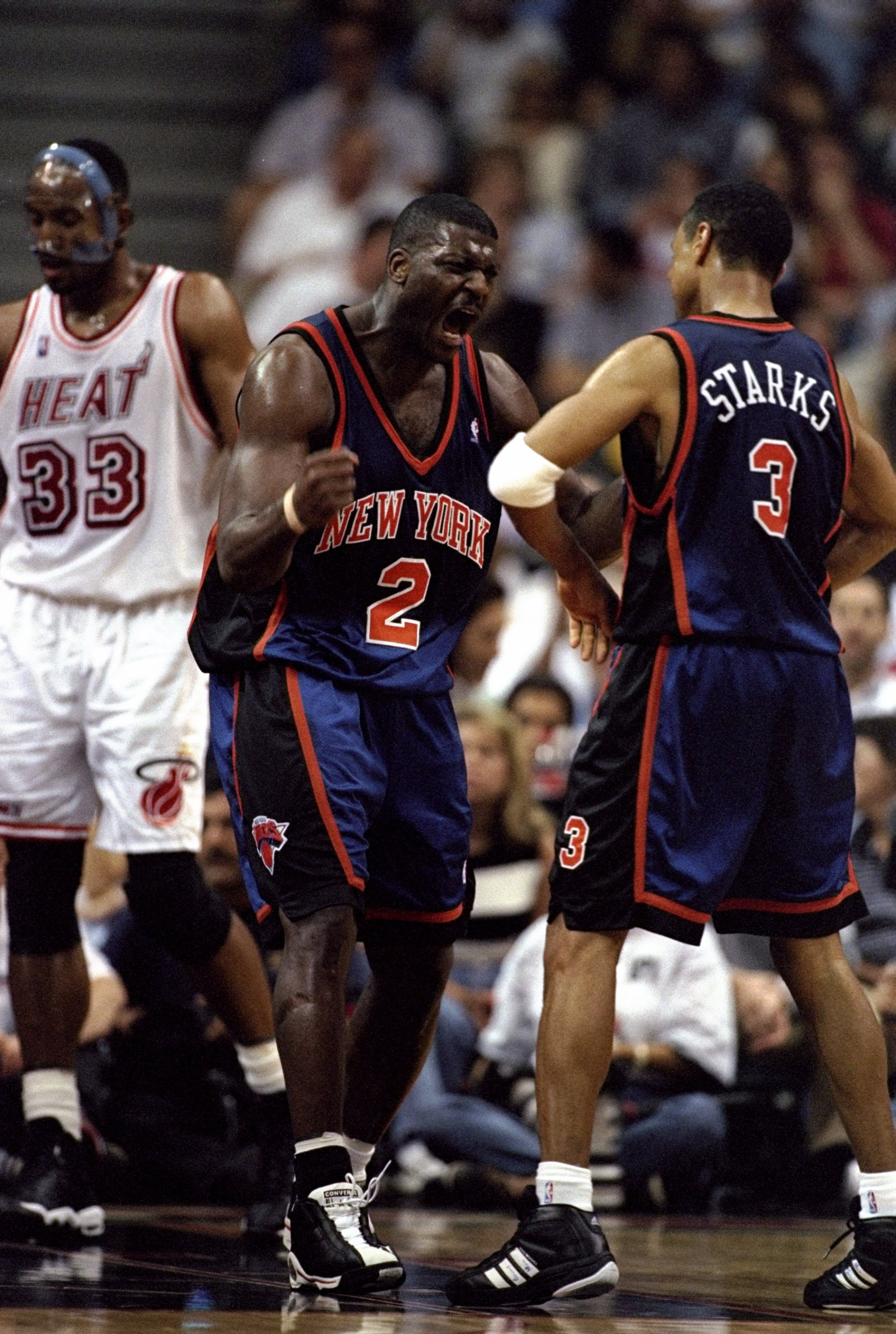 26 Apr 1998: Forward Larry Johnson and guard John Starks of the New York Knicks in action against the Miami Heat during an NBA playoff game at the Miami Arena in Miami, Florida. The Knicks defeated the Heat 96-86.