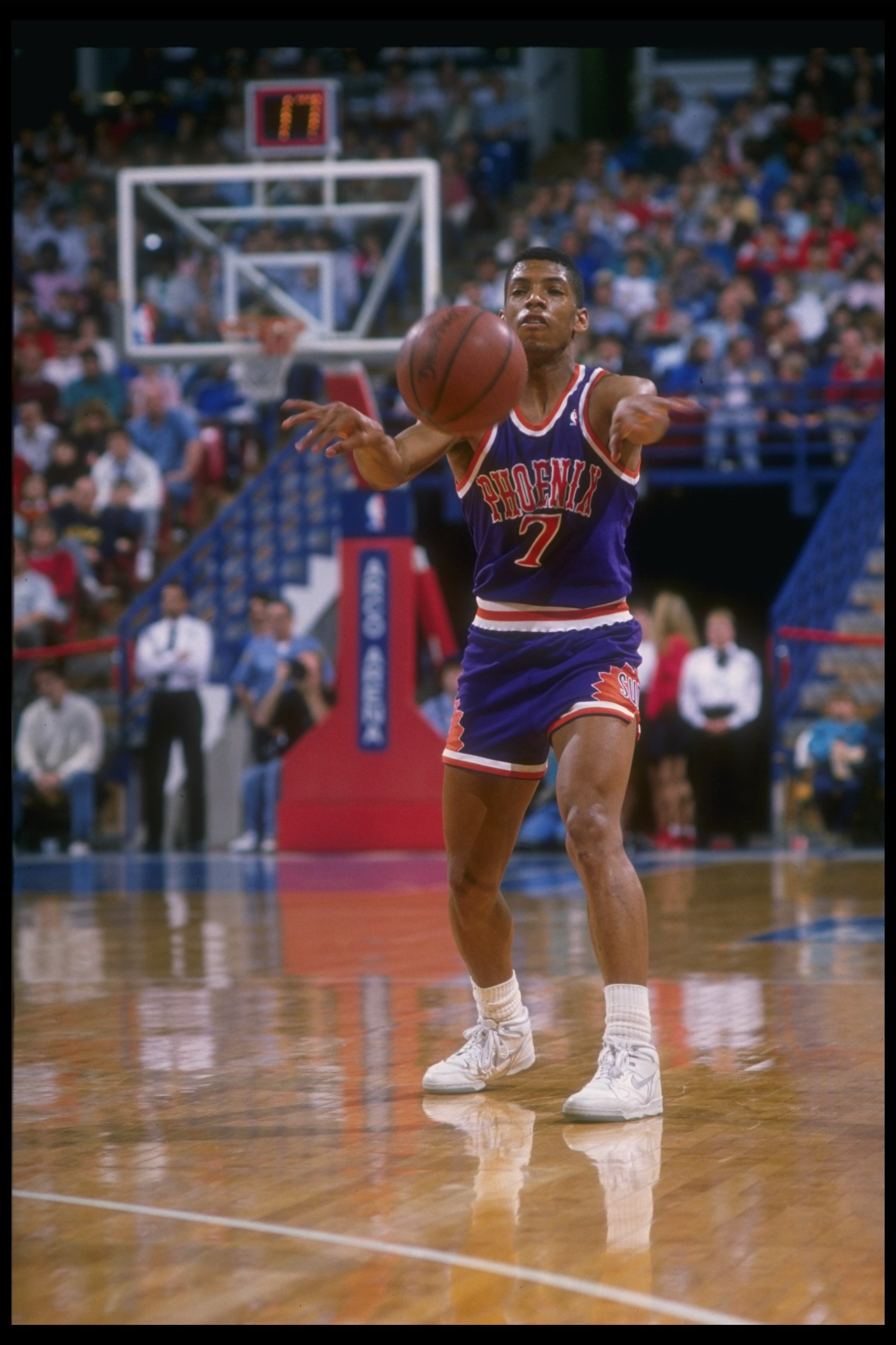 1988-1989:  Guard Kevin Johnson of the Phoenix Suns moves the ball during a game. Mandatory Credit: Otto Greule  /Allsport Mandatory Credit: Otto Greule  /Allsport