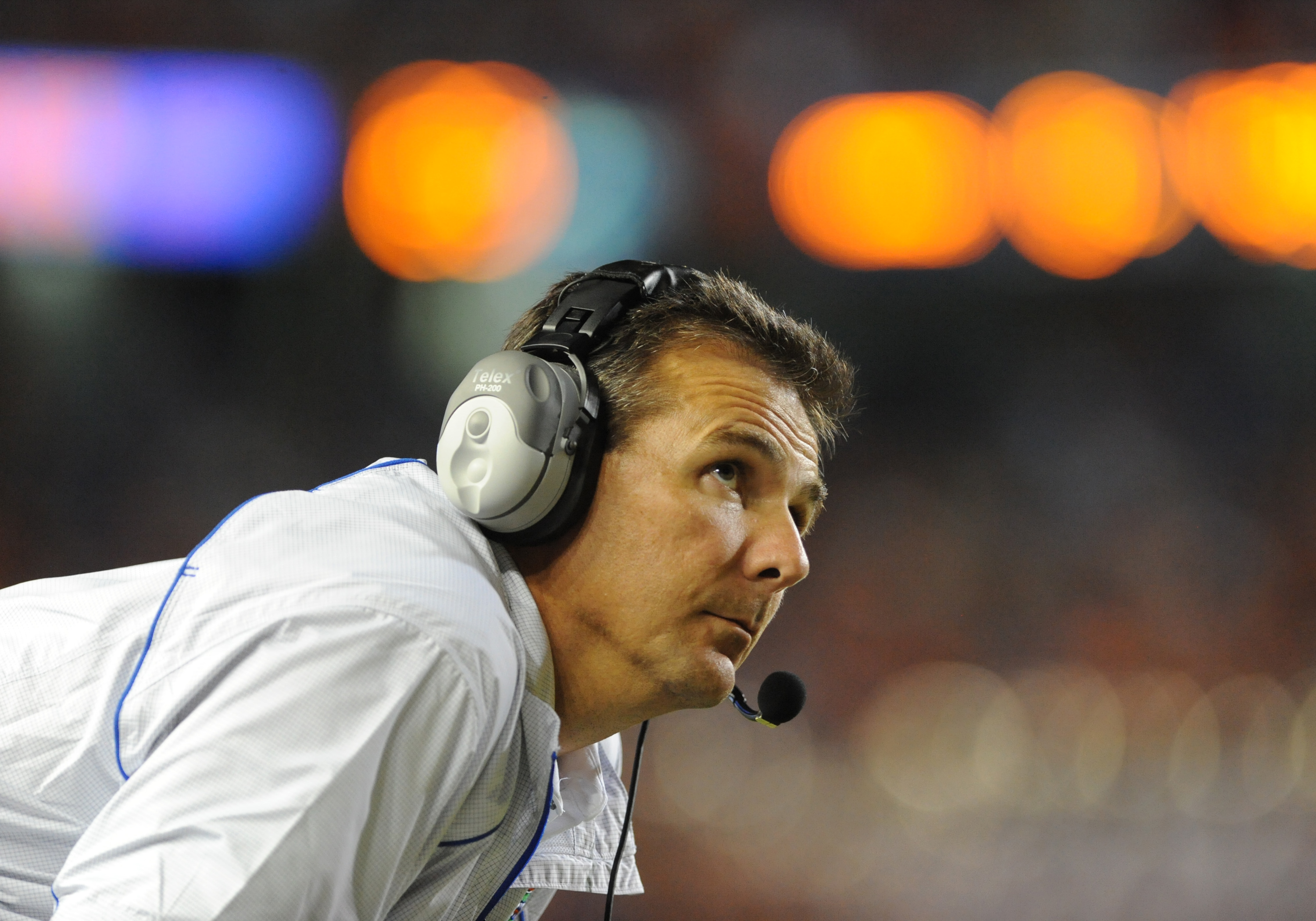 GAINESVILLE, FL - OCTOBER 16:  Coach urban Meyer of the Florida Gators checks the scoreboard during play against the Mississippi State Bulldogs October 16, 2010 Ben Hill Griffin Stadium at Gainesville, Florida.  (Photo by Al Messerschmidt/Getty Images)