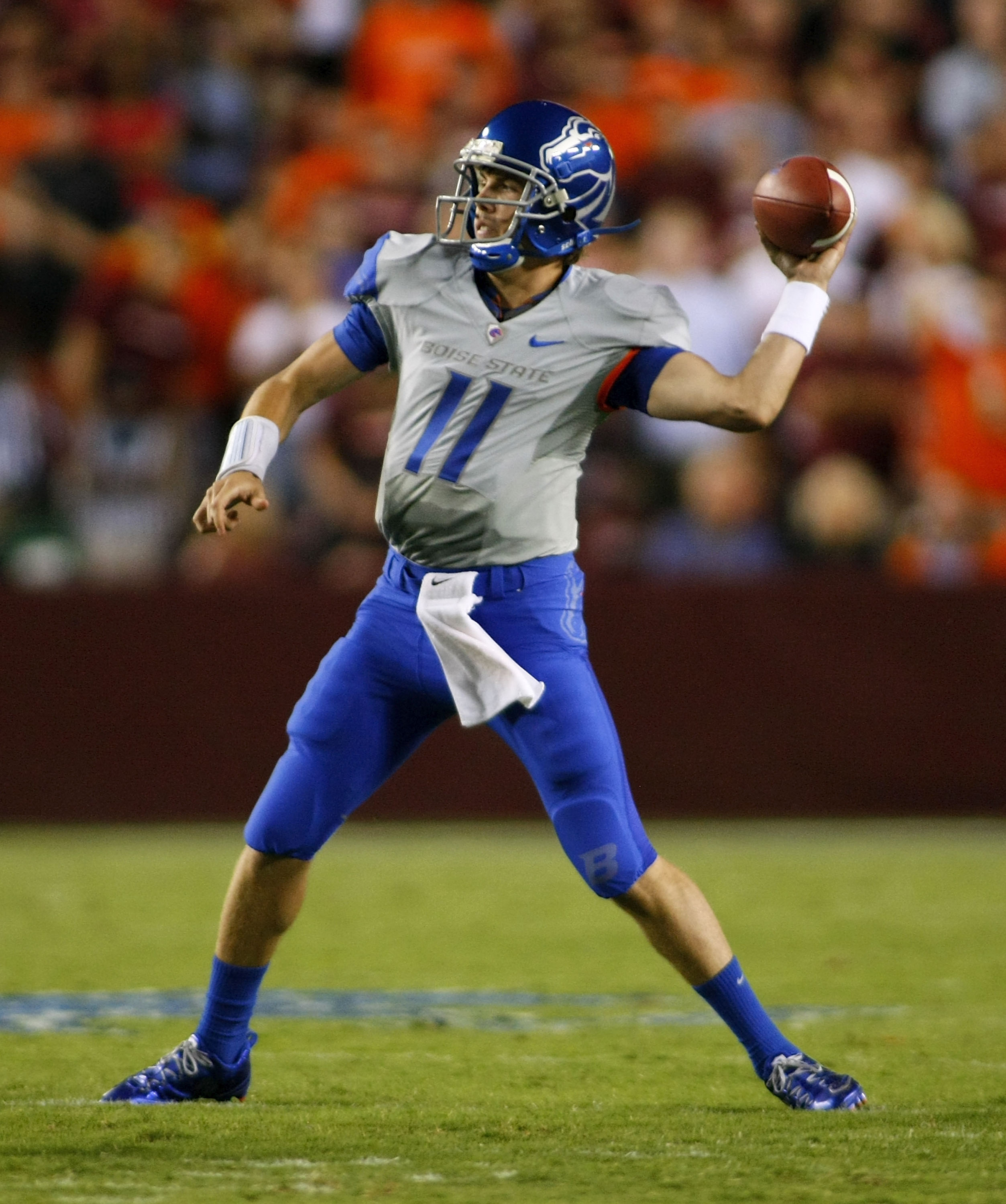 LANDOVER, MD - SEPTEMBER 06:  Quarterback Kellen Moore #11 of the Boise State Broncos passes against the Virginia Tech Hokies at FedExField on September 6, 2010 in Landover, Maryland.  (Photo by Geoff Burke/Getty Images)