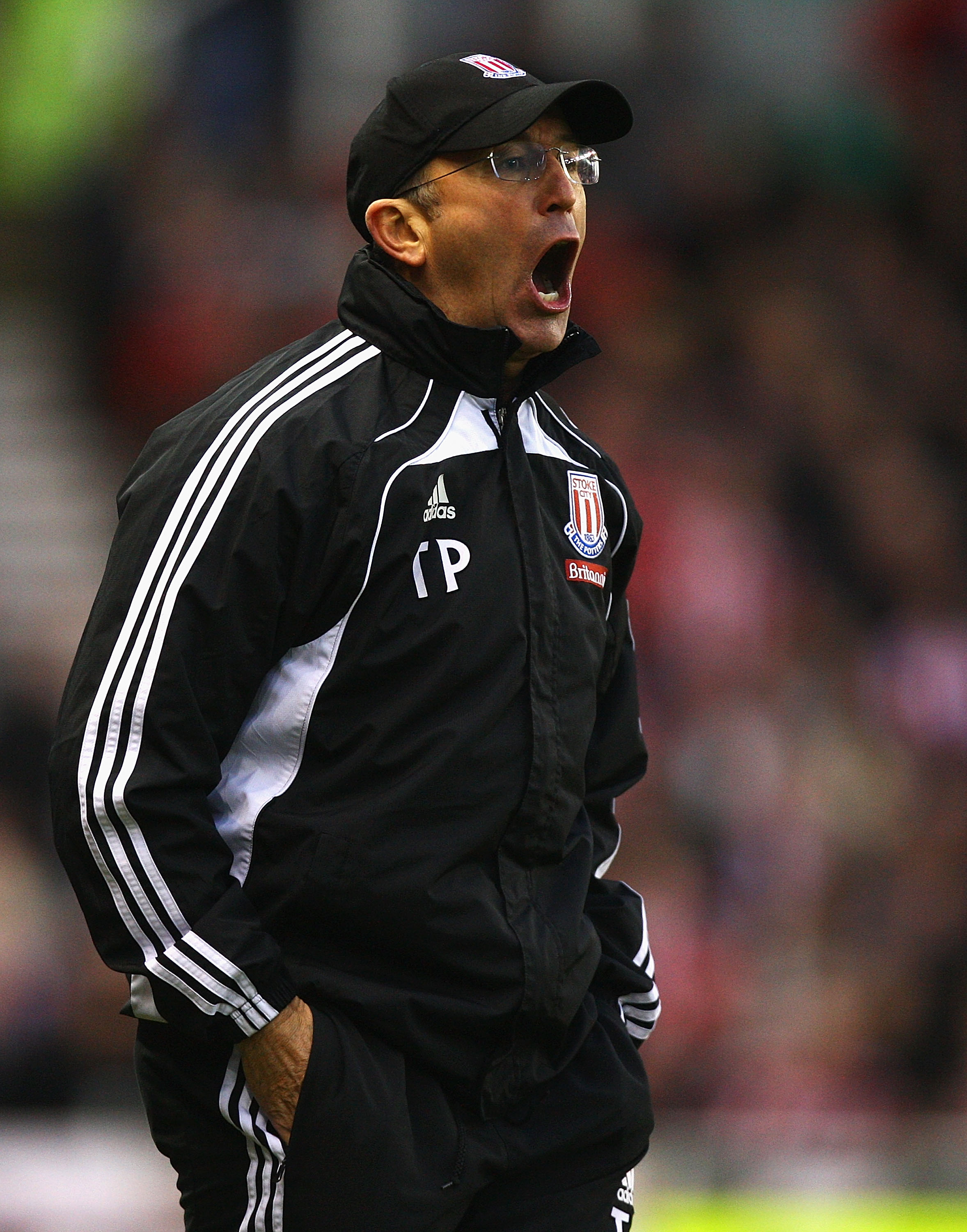 STOKE ON TRENT, ENGLAND - DECEMBER 11:  Tony Pulis, manager of Stoke City shows his frustration, as a chance on goal is missed during the Barclays Premier League match between Stoke City and Blackpool at Britannia Stadium on December 11, 2010 in Stoke on