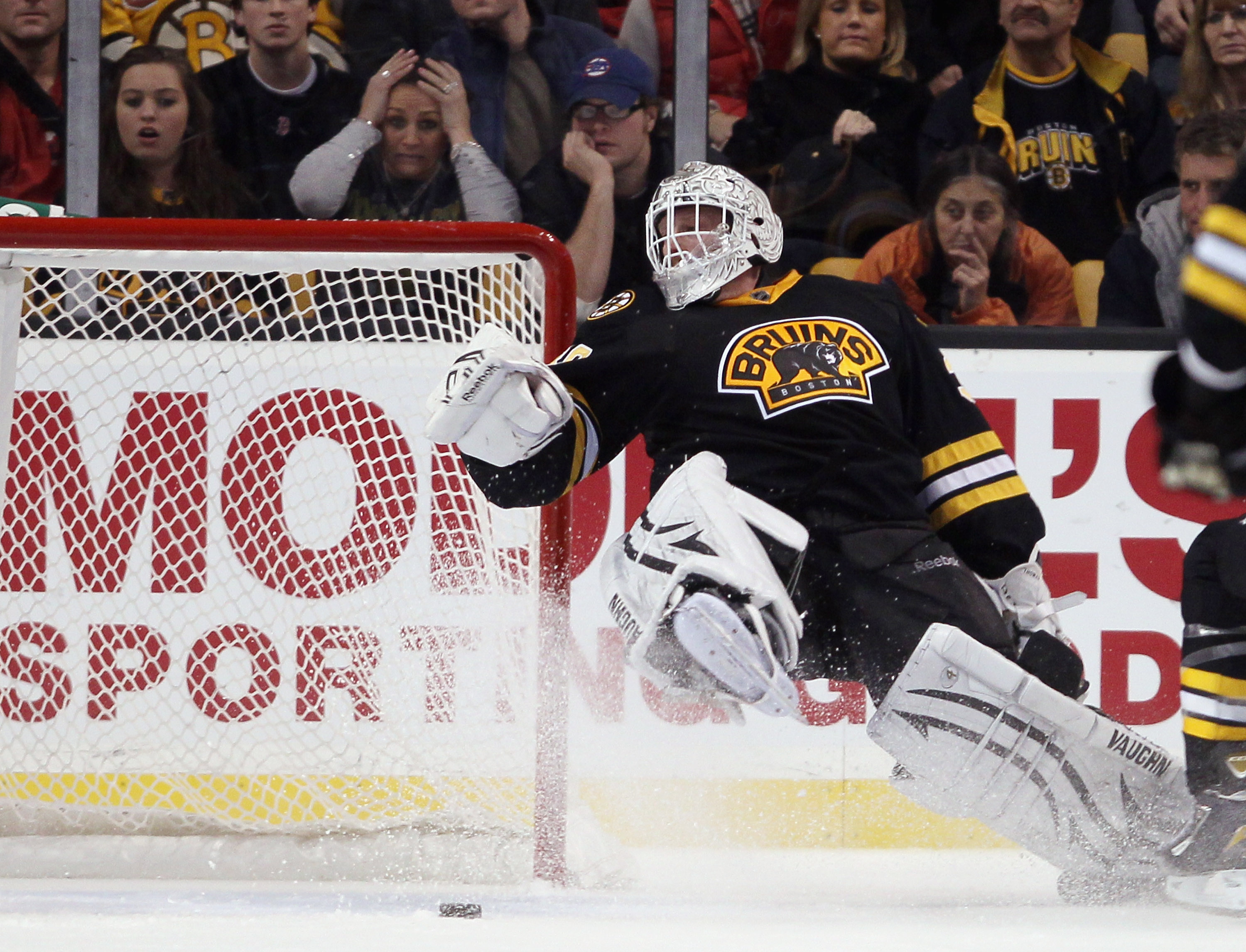 BOSTON, MA - DECEMBER 11:  Tim Thomas #30  of the Boston Bruins makes a save against the Philadelphia Flyers on December 11, 2010 at the TD Garden in Boston, Massachusetts. The Flyers defeated the Bruins 2-1 in overtime.  (Photo by Elsa/Getty Images)