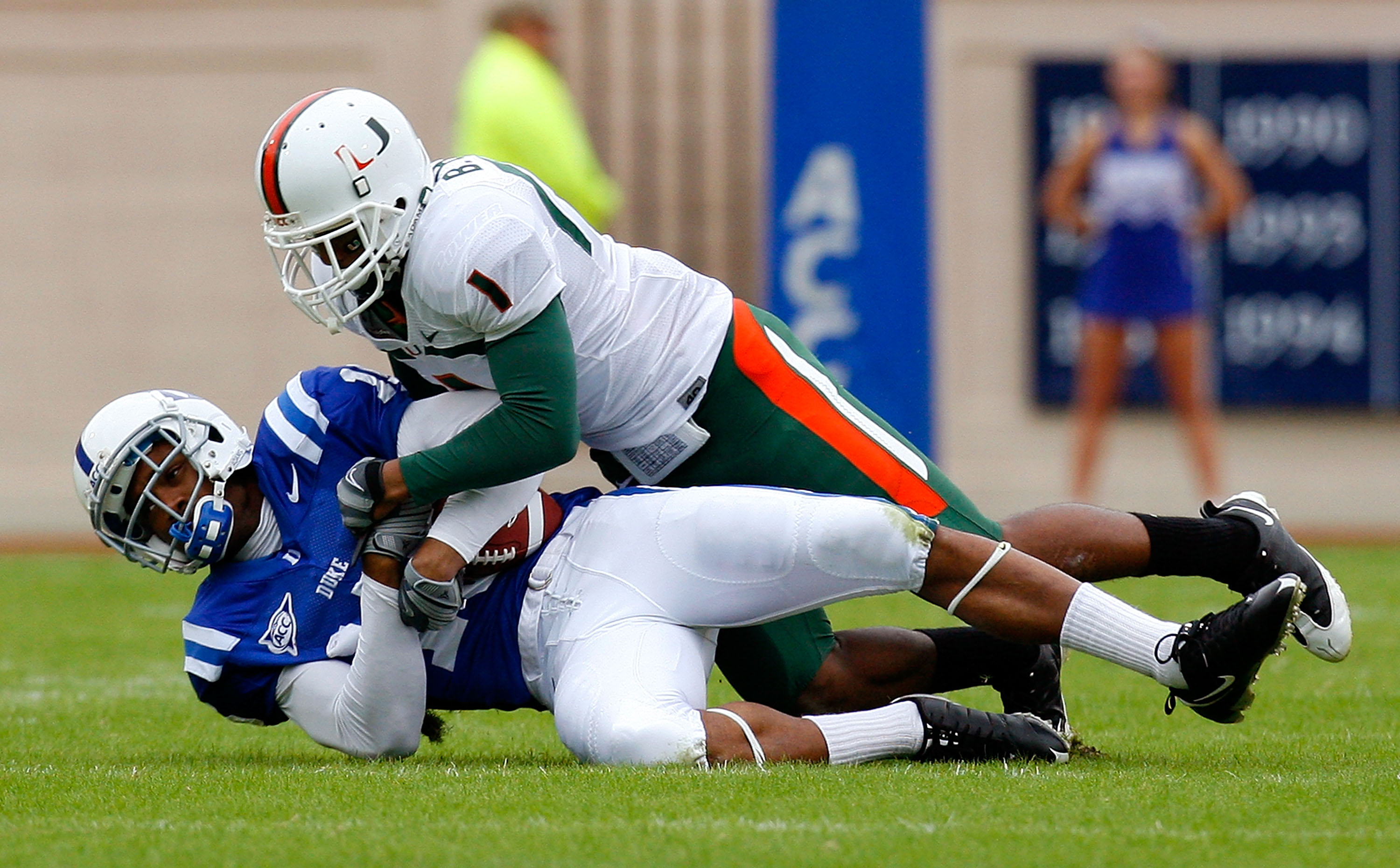 DURHAM, NC - OCTOBER 18:  Receiver Eron Riley #15 of the Duke Blue Devils pulls in this reception against Brandon Harris #1 of the Miami Hurricanes during the game at Wallace Wade Stadium on October 18, 2008 in Durham, North Carolina.  (Photo by Kevin C.