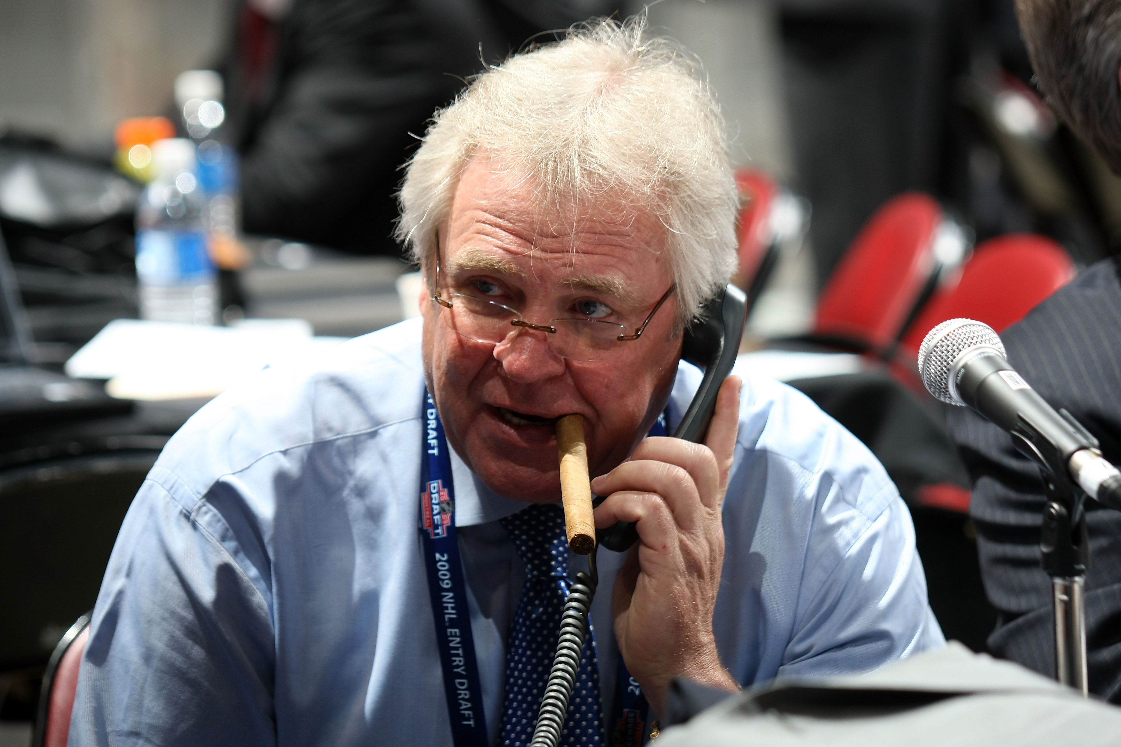 MONTREAL, QC - JUNE 27:  General Manager and President Glen Sather of the New York Rangers works the phones during the 2009 NHL Entry Draft at the Bell Centre on June 27, 2009 in Montreal, Quebec, Canada.  (Photo by Bruce Bennett/Getty Images)
