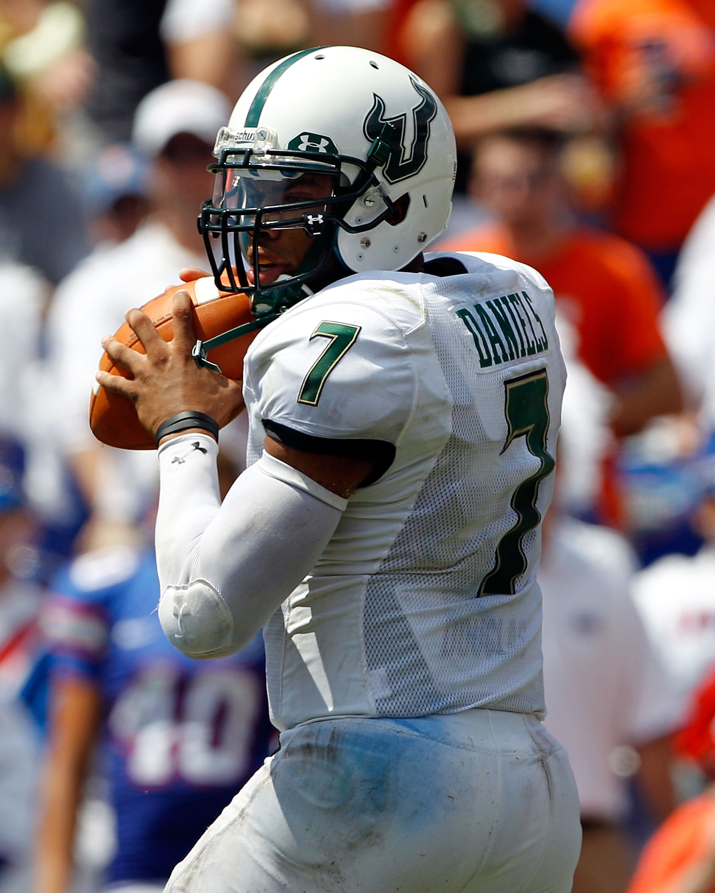 GAINESVILLE, FL - SEPTEMBER 11: Quarterback B.J. Daniels #7 of the South Florida Bulls attempts a pass during a game against the Florida Gators at Ben Hill Griffin Stadium on September 11, 2010 in Gainesville, Florida. (Photo by Sam Greenwood/Getty Imag