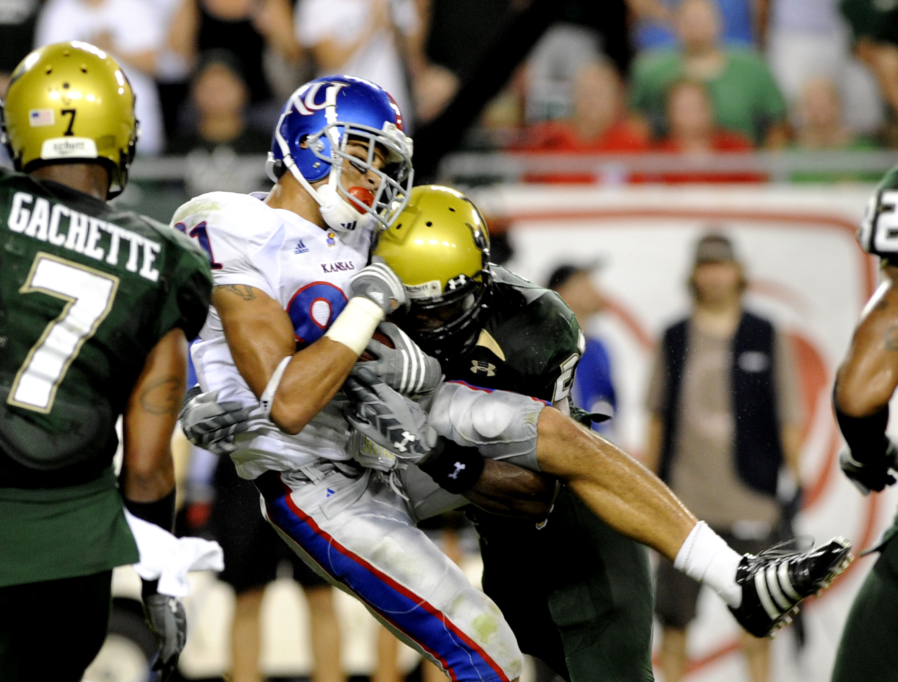 TAMPA, FL - SEPTEMBER 12: Wide receiver Jonathan Wilson #81 of the Kansas University Jayhawks grabs a pass against the University of South Florida Bulls at Raymond James Stadium on September 12, 2008 in Tampa, Florida. (Photo by Al Messerschmidt/Getty I