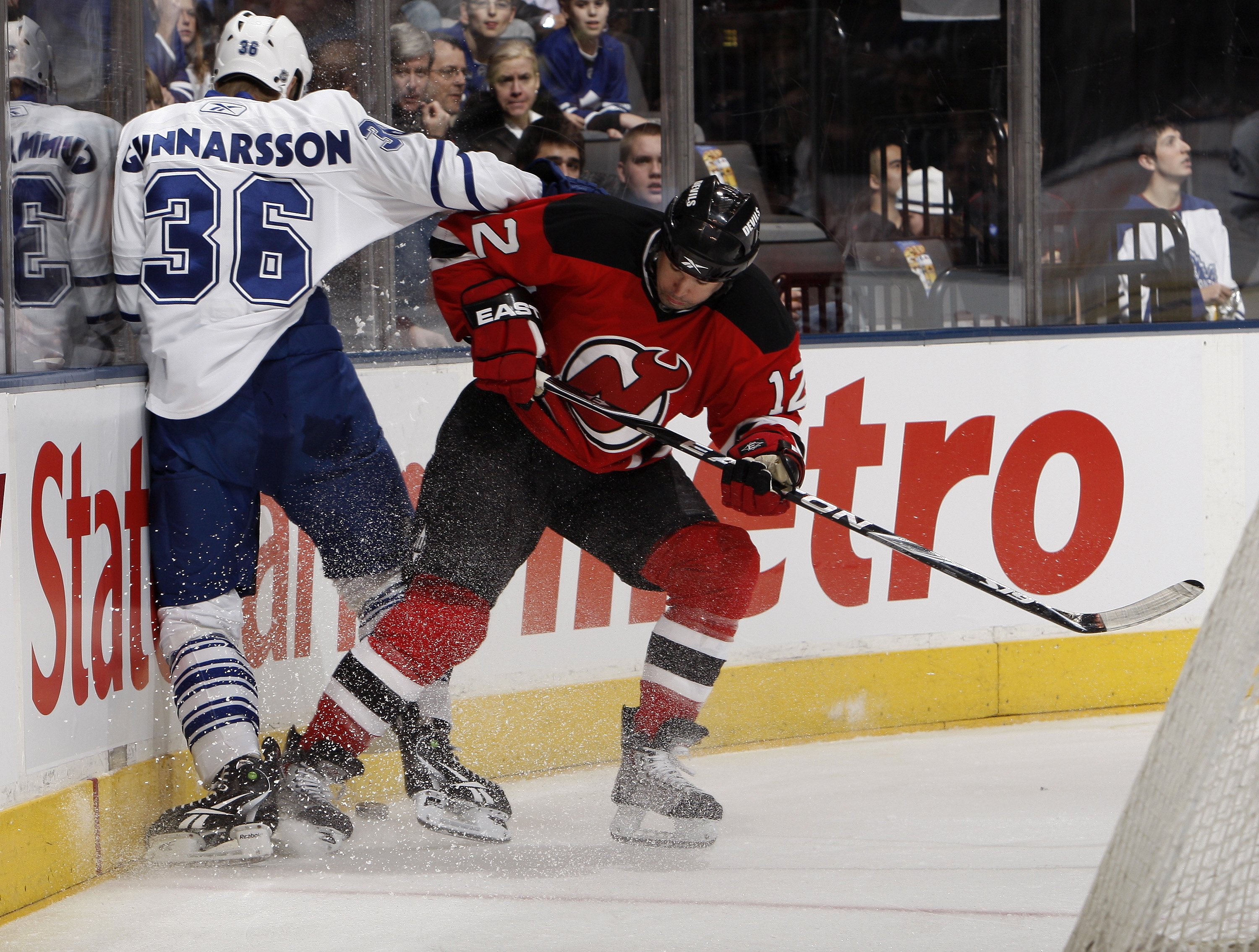 TORONTO - FEBRUARY 2: Carl Gunnarsson #36 of the Toronto Maple Leafs runs into Brian Rolston #12 of the New Jersey Devils during game action on February 2, 2010 at the Air Canada Centre in Toronto, Ontario, Canada. (Photo by Abelimages/Getty Images)