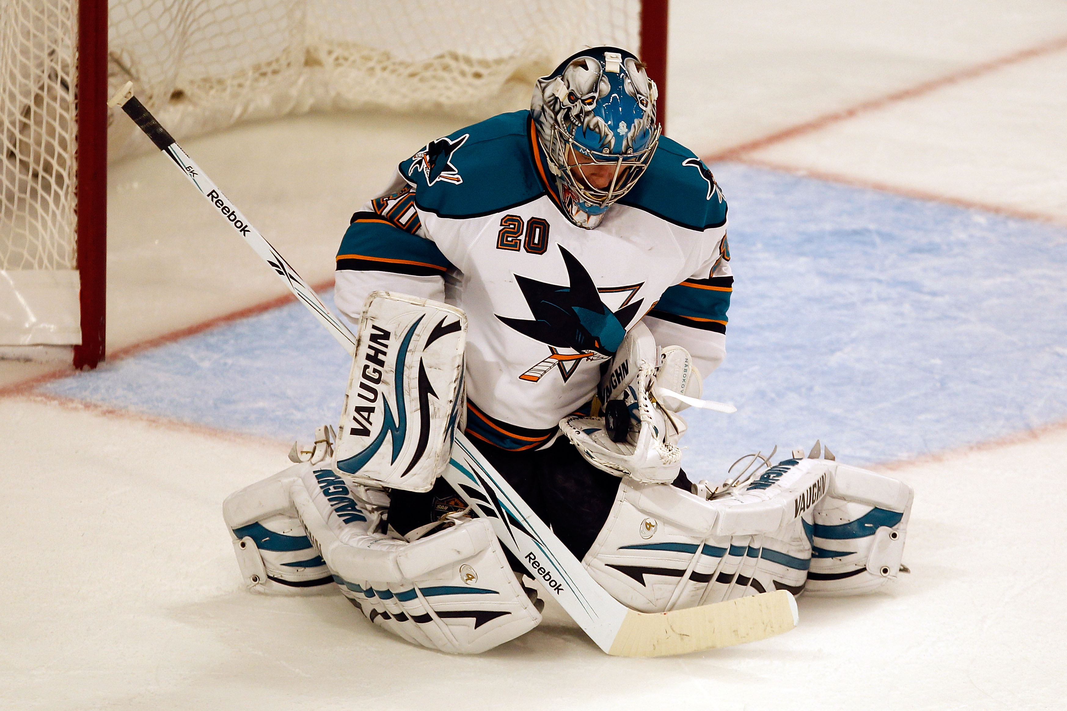 CHICAGO - MAY 23:  Goaltender Evgeni Nabokov #20 of the San Jose Sharks makes a second period save while taking on the Chicago Blackhawks in Game Four of the Western Conference Finals during the 2010 NHL Stanley Cup Playoffs at the United Center on May 23