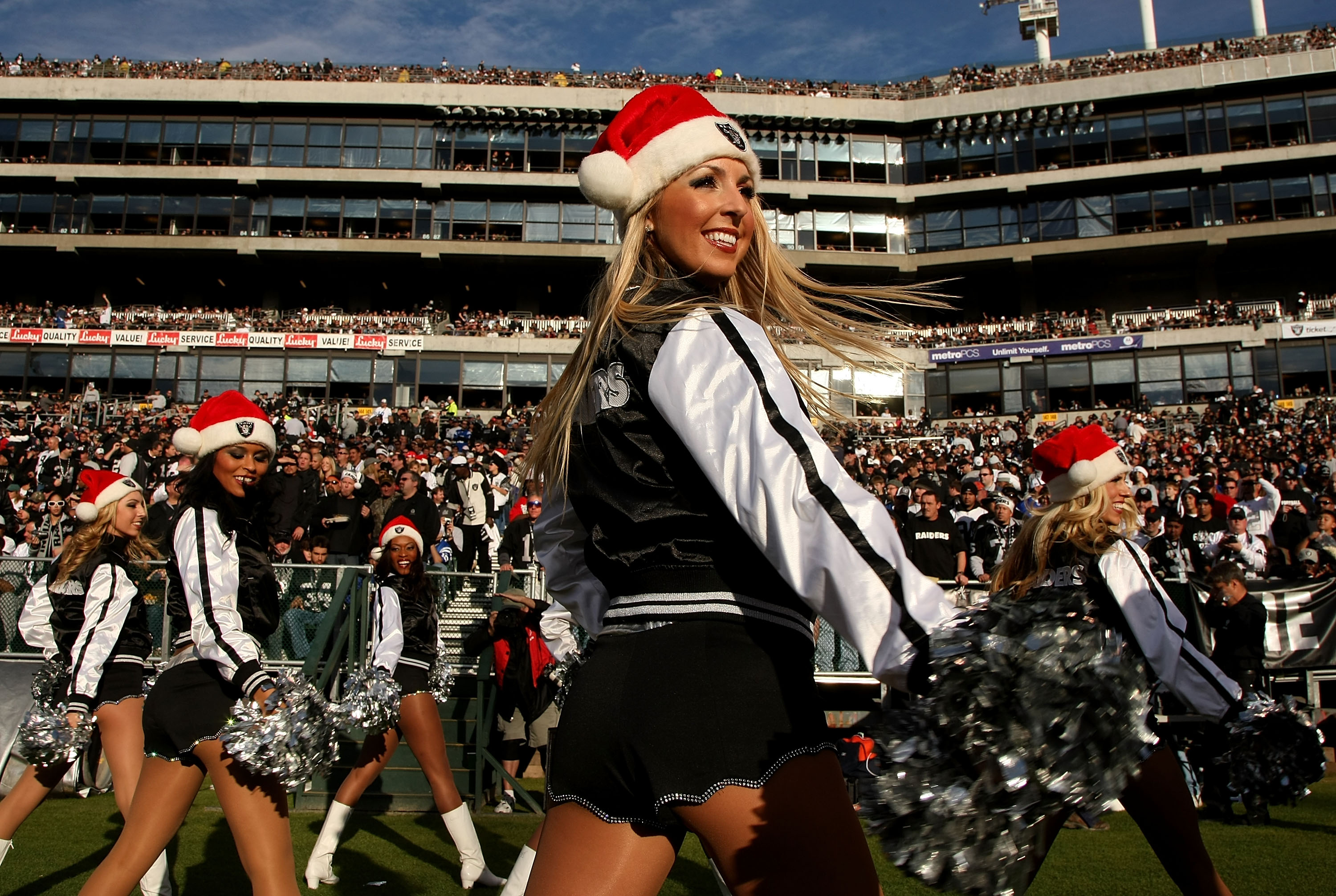 OAKLAND, CA - DECEMBER 16: The Raiderettes perform during the game between the Indianapolis Colts and the Oakland Raiders at McAfee Coliseum December 16, 2007 in Oakland, California. The Colts won 21-14.  (Photo by Stephen Dunn/Getty Images)
