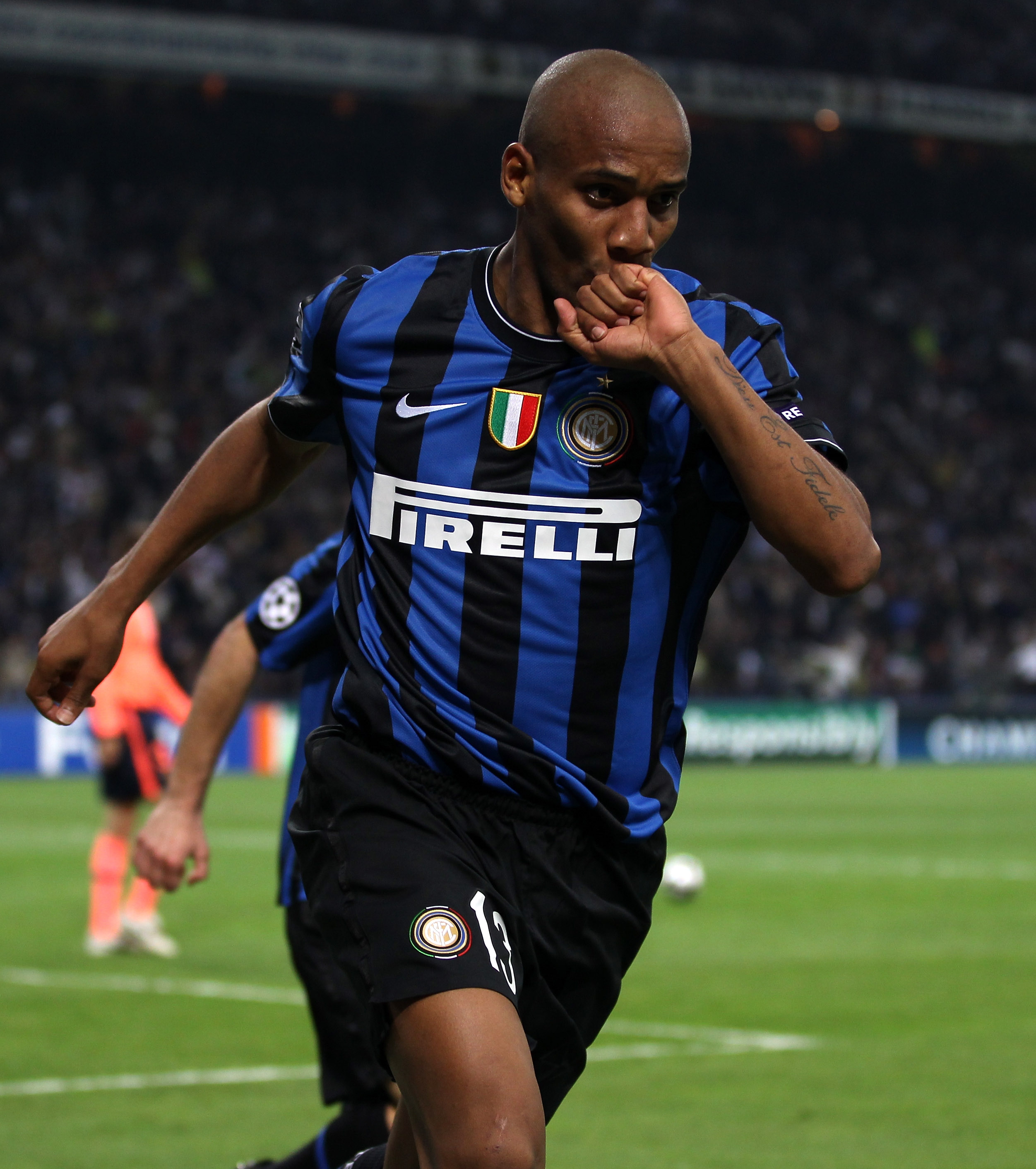 MILAN, ITALY - APRIL 20:  Maicon of Inter celebrates scoring his teams second goal during the UEFA Champions League Semi Final 1st Leg match between Inter Milan and Barcelona at the San Siro on April 20, 2010 in Milan, Italy.  (Photo by Julian Finney/Gett
