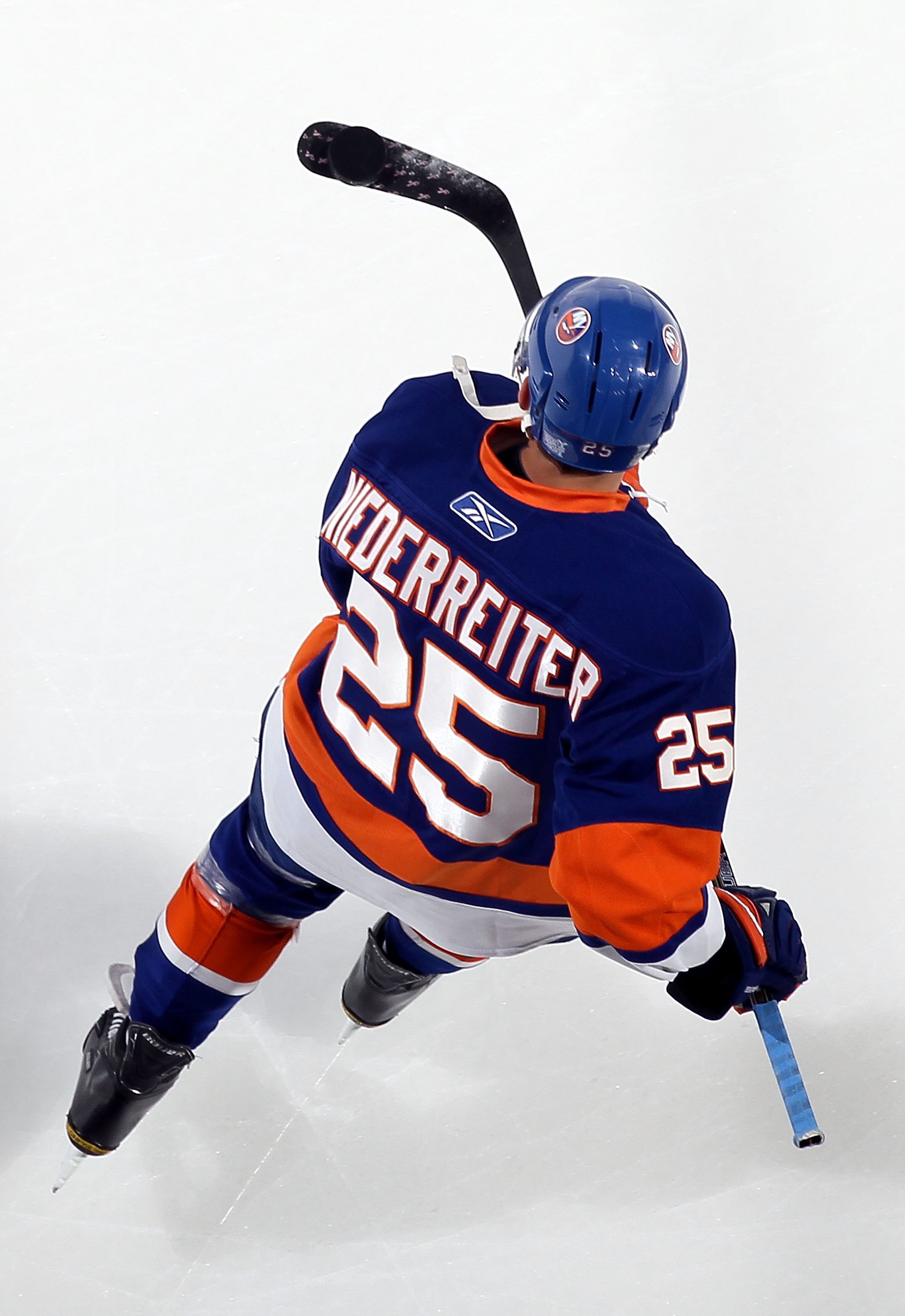 UNIONDALE, NY - OCTOBER 16: Nino Niederreiter #25 of the New York Islanders warms up before playing against the Colorado Avalanche on October 16, 2010 at Nassau Coliseum in Uniondale, New York. (Photo by Jim McIsaac/Getty Images)