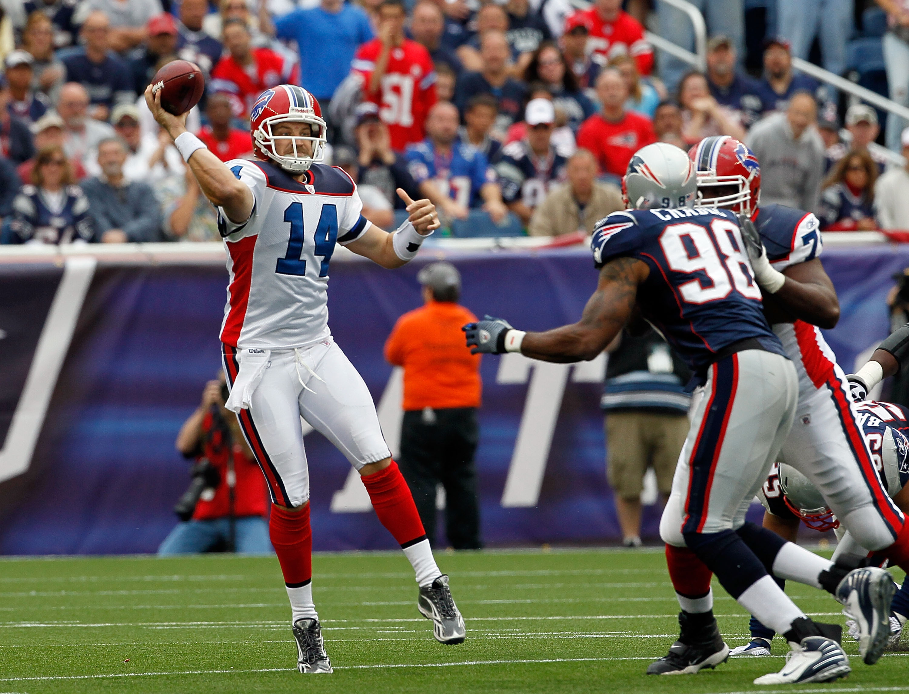 New England Patriots QB Tom Brady hands off to New England Patriots running  back Fred Taylor (21) in the second quarter against the Atlanta Falcons at  Gillette Stadium in Foxboro, Massachusetts on