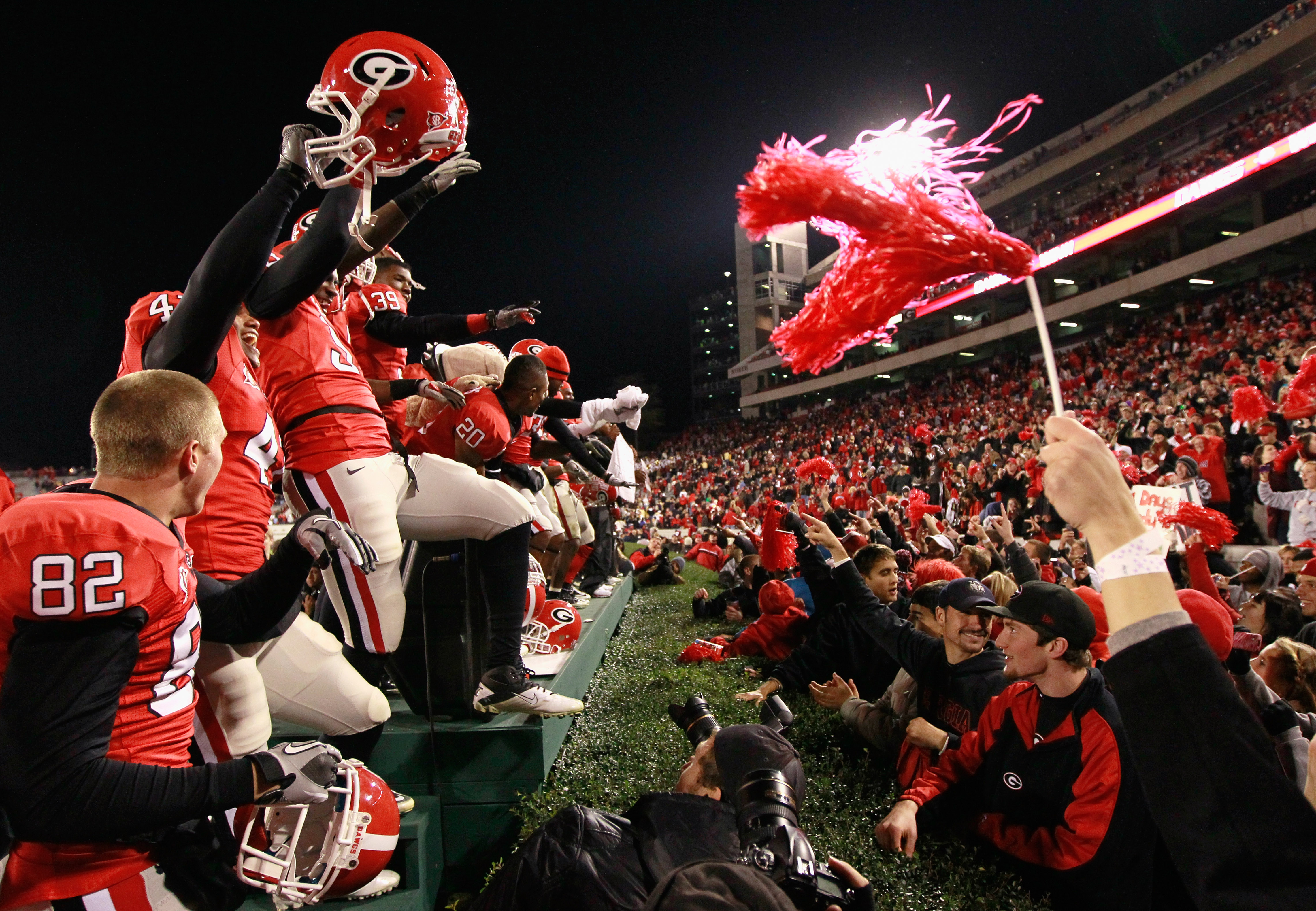 ATHENS, GA - NOVEMBER 27:  The Georgia Bulldogs celebrate their 42-34 win over the Georgia Tech Yellow Jackets at Sanford Stadium on November 27, 2010 in Athens, Georgia.  (Photo by Kevin C. Cox/Getty Images)