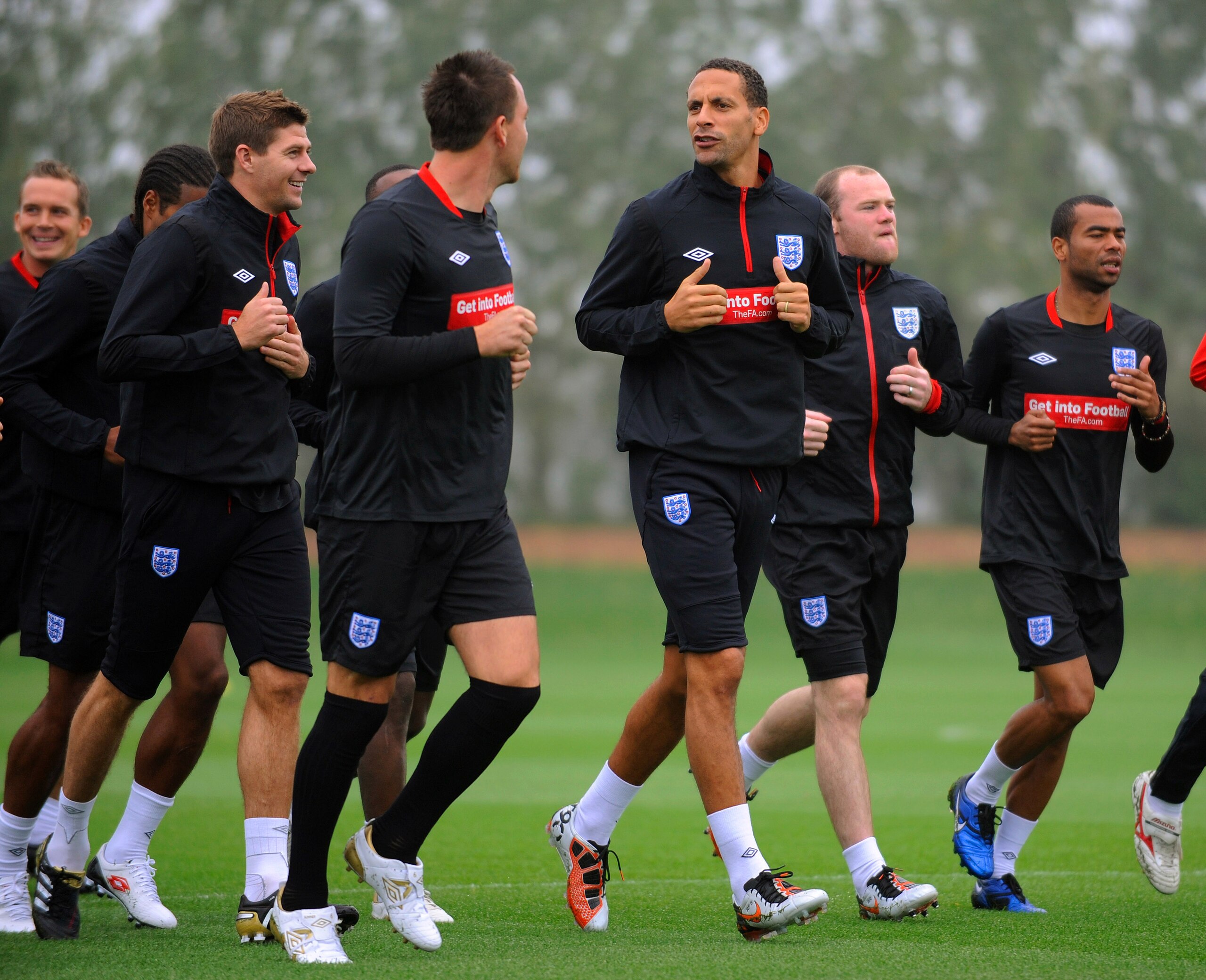 ST ALBANS, ENGLAND - OCTOBER 08:  John Terry, Rio Ferdinand, Steven Gerrard, Wayne Rooney and Ashley Cole warm up during the England training session at London Colney on October 8, 2010 in St Albans, England.  (Photo by Michael Regan/Getty Images)