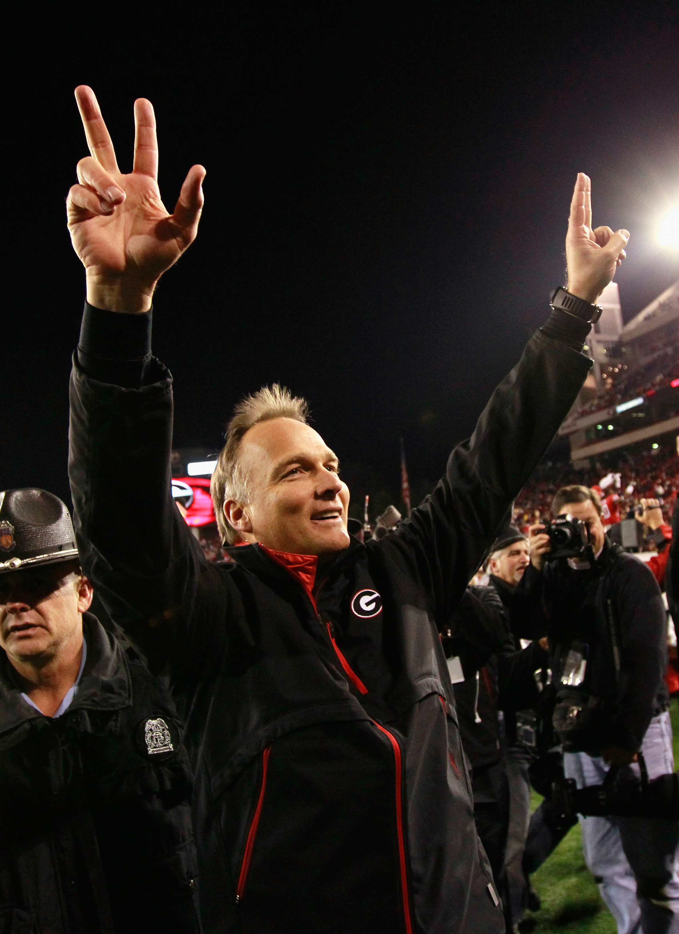 ATHENS, GA - NOVEMBER 27:  Head coach Mark Richt of the Georgia Bulldogs celebrates their 42-34 win over the Georgia Tech Yellow Jackets at Sanford Stadium on November 27, 2010 in Athens, Georgia.  (Photo by Kevin C. Cox/Getty Images)