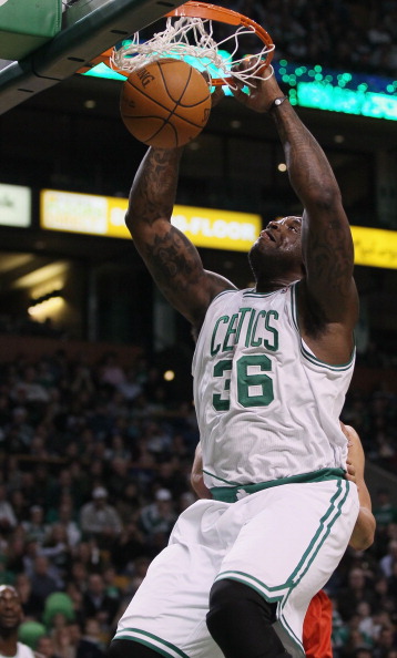 BOSTON - NOVEMBER 24:  Shaquille O'Neal #36 of the Boston Celtics dunks the ball in the first quarter against the New Jersey Nets on November 24, 2010 at the TD Garden in Boston, Massachusetts. NOTE TO USER: User expressly acknowledges and agrees that, by