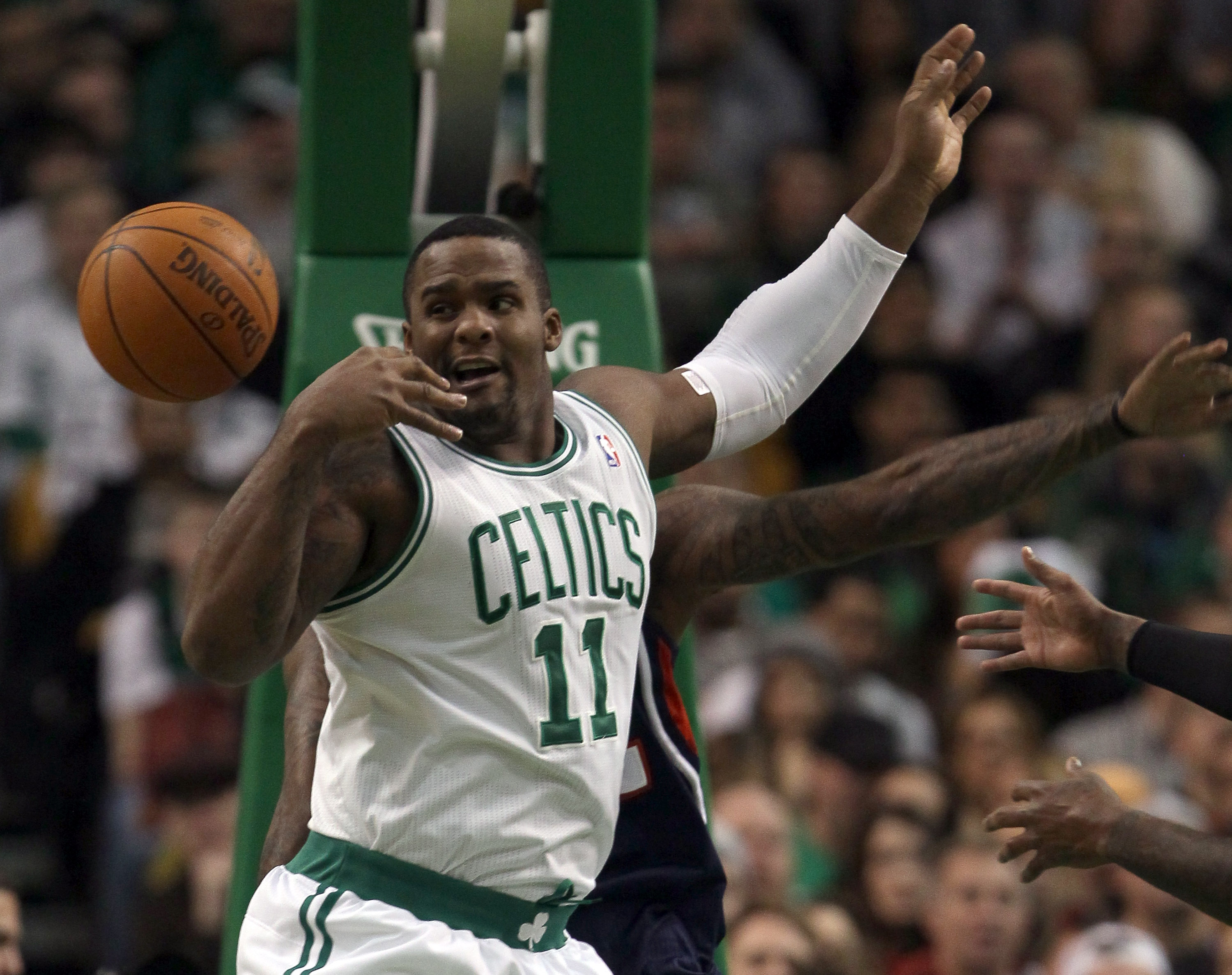 BOSTON, MA - DECEMBER 16:  Glen Davis #11 of the Boston Celtics tries to grab the loose ball in the first half against the Atlanta Hawks on December 16, 2010 at the TD Garden in Boston, Massachusetts. NOTE TO USER: User expressly acknowledges and agrees t