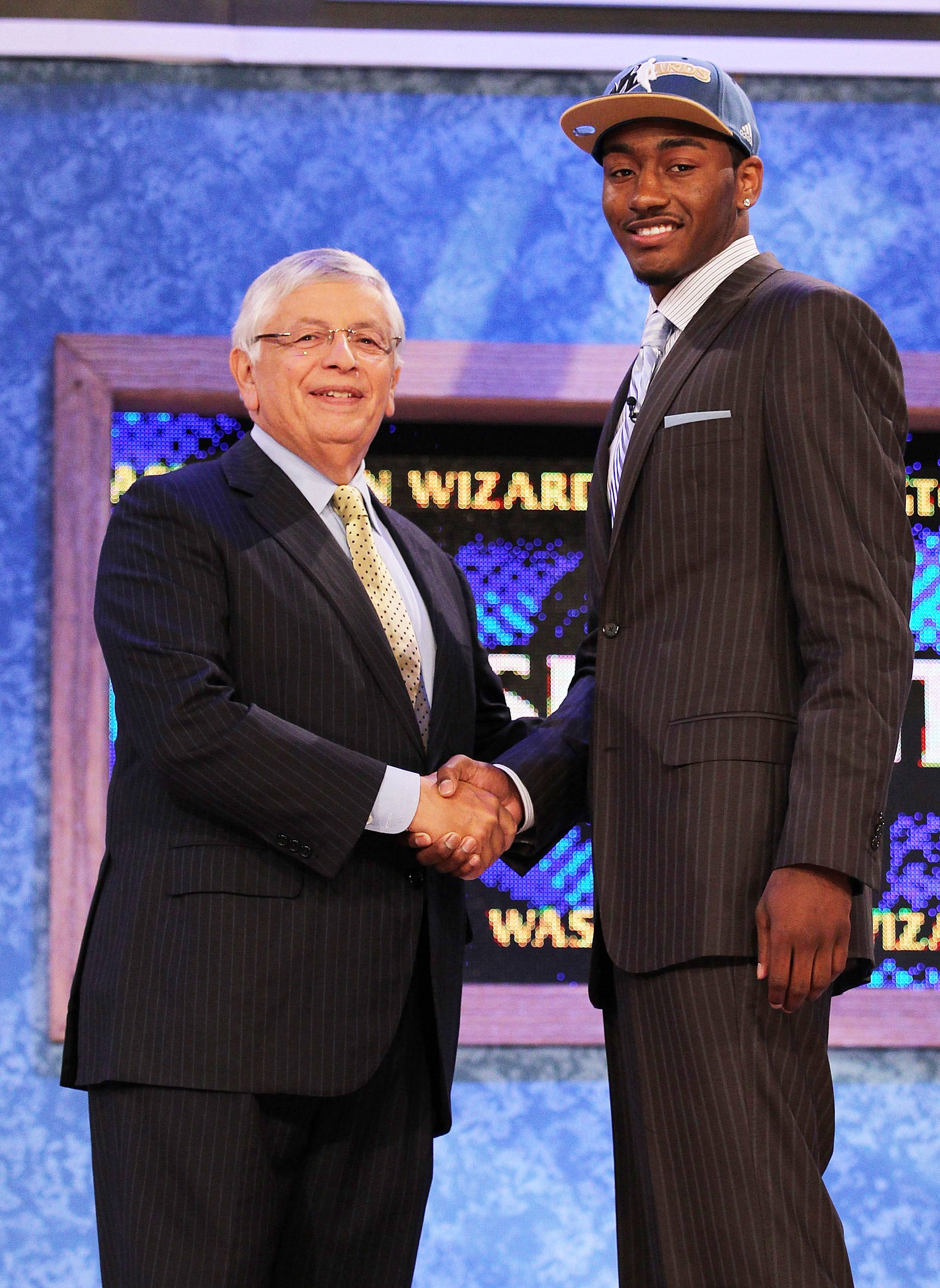 NEW YORK - JUNE 24:  John Wall of Kentucky stands with NBA Commisioner David Stern after being drafted with the first pick by The Washington Wizards at Madison Square Garden on June 24, 2010 in New York, New York City. NOTE TO USER: User expressly acknowl