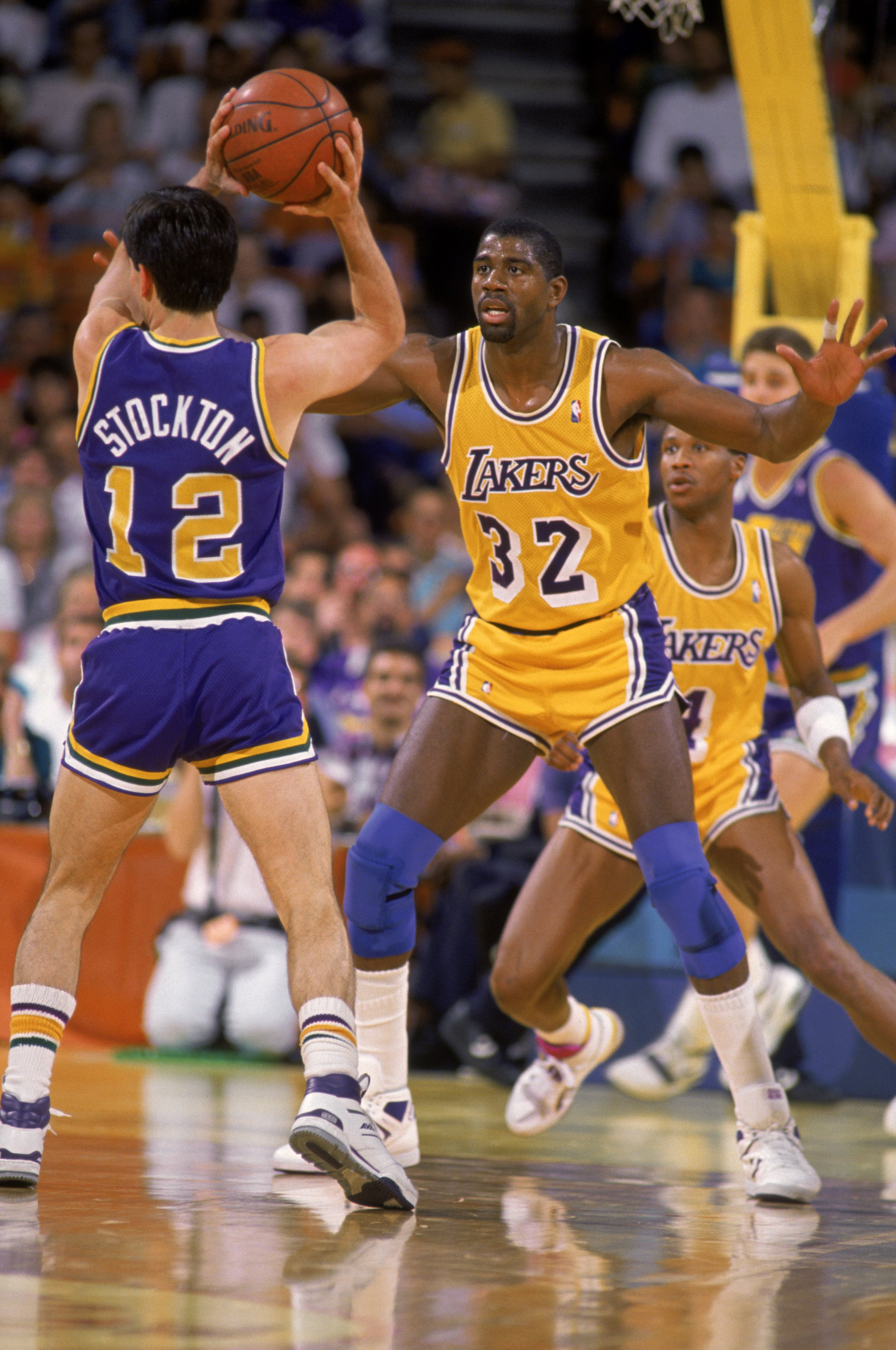 John Stockton of the Utah Jazz stands on the court during an NBA game