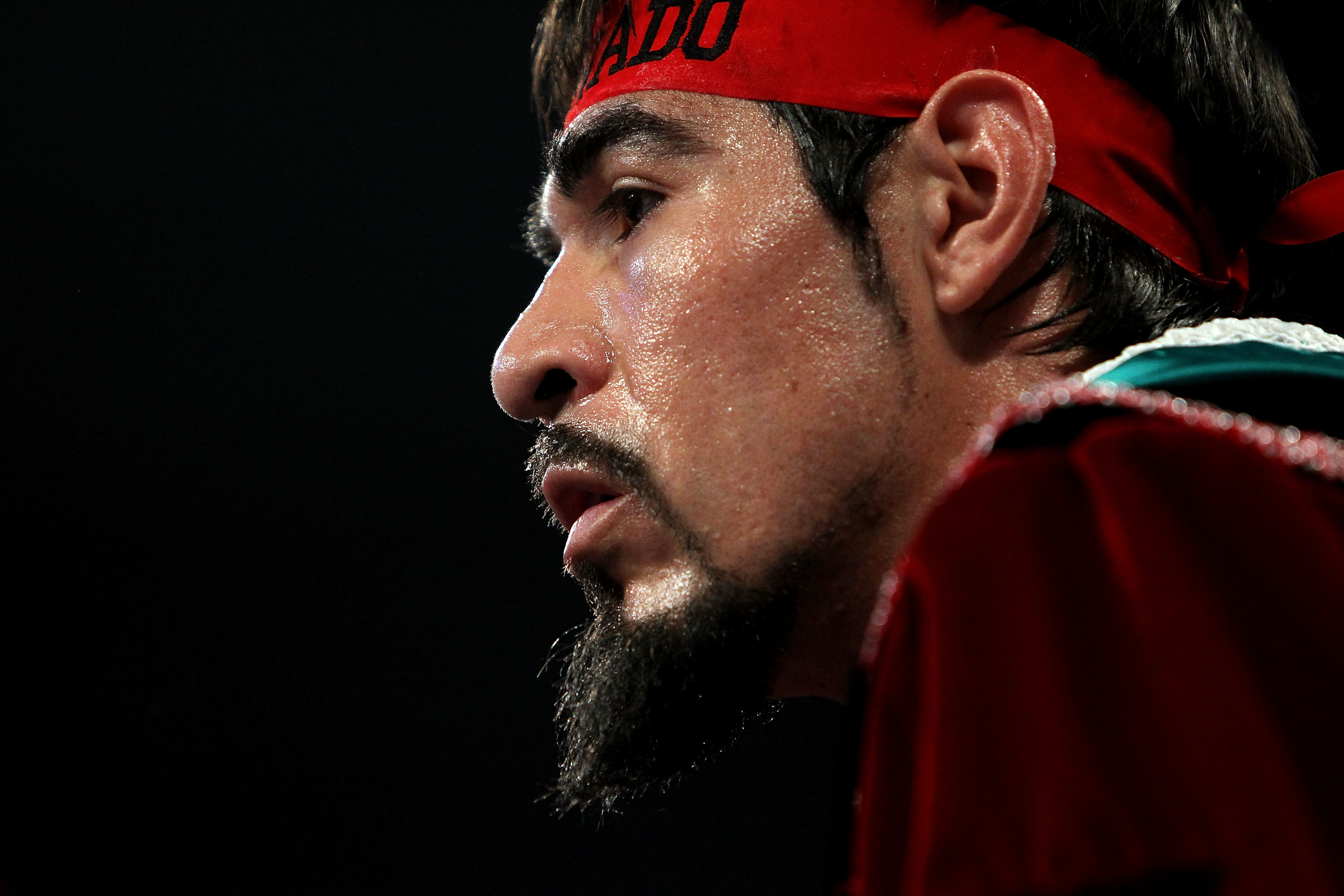 ARLINGTON, TX - NOVEMBER 13:  Antonio Margarito (black trunks) of Mexico looks on from his corner as he waits to fight Manny Pacquiao of the Philippines during their WBC World Super Welterweight Title bout at Cowboys Stadium on November 13, 2010 in Arling