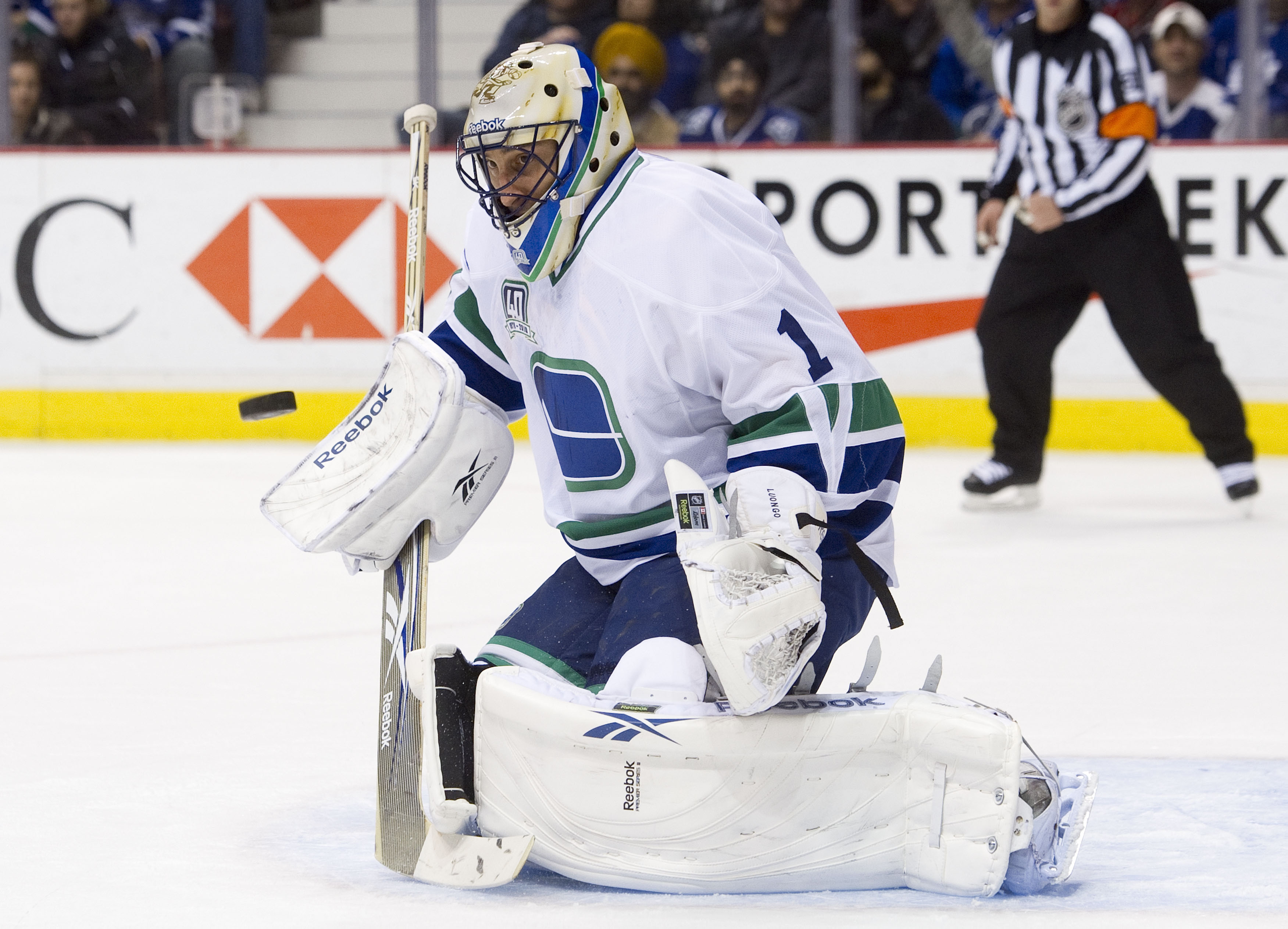 VANCOUVER, CANADA - DECEMBER 18: Goalie Roberto Luongo #1 of the Vancouver Canucks keeps an eye on the airborne puck after making a save against the Toronto Maple Leafs during the first period in NHL action on December 18, 2010 at Rogers Arena in Vancouve