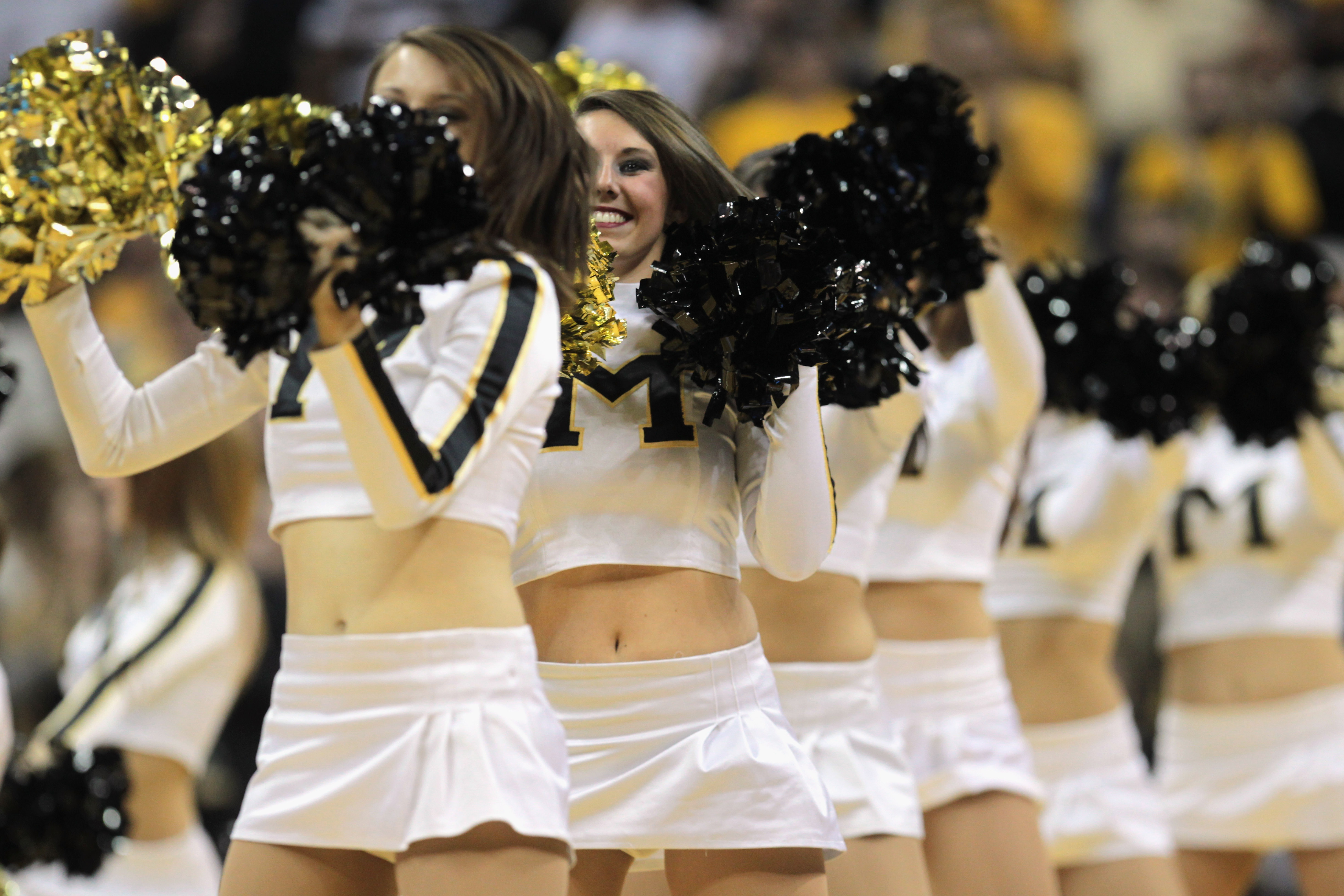COLUMBIA, MO - DECEMBER 08:  Missouri Tiger cheerleaders in action during the game between the Vanderbilt Commodores and the Missouri Tigers on December 8, 2010 at Mizzou Arena in Columbia, Missouri.  (Photo by Jamie Squire/Getty Images)