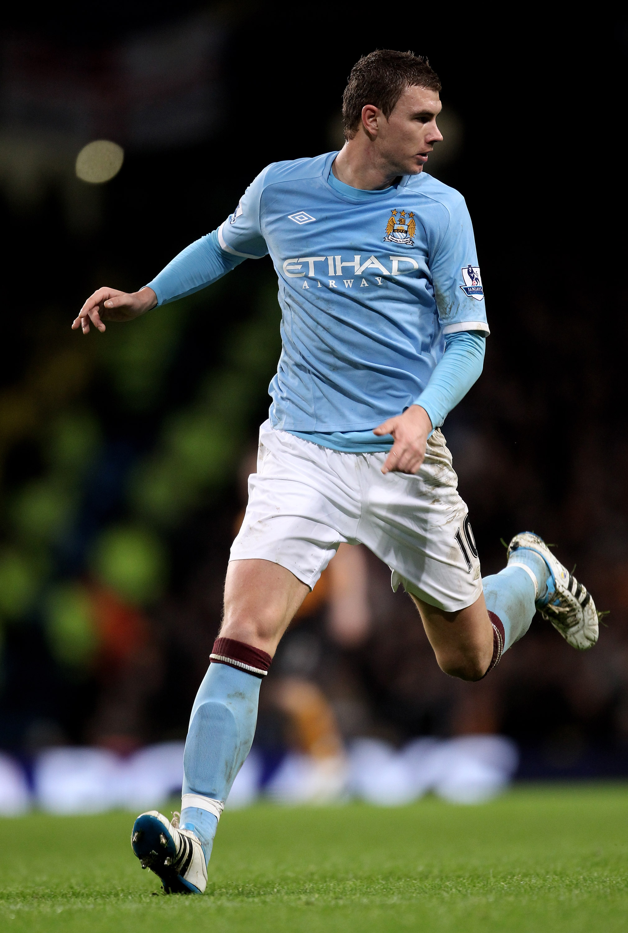 MANCHESTER, ENGLAND - JANUARY 15:  Edin Dzeko of Manchester City in action during the Barclays Premier League match between Manchester City and Wolverhampton Wanderers at the City of Manchester Stadium on January 15, 2011 in Manchester, England.  (Photo b