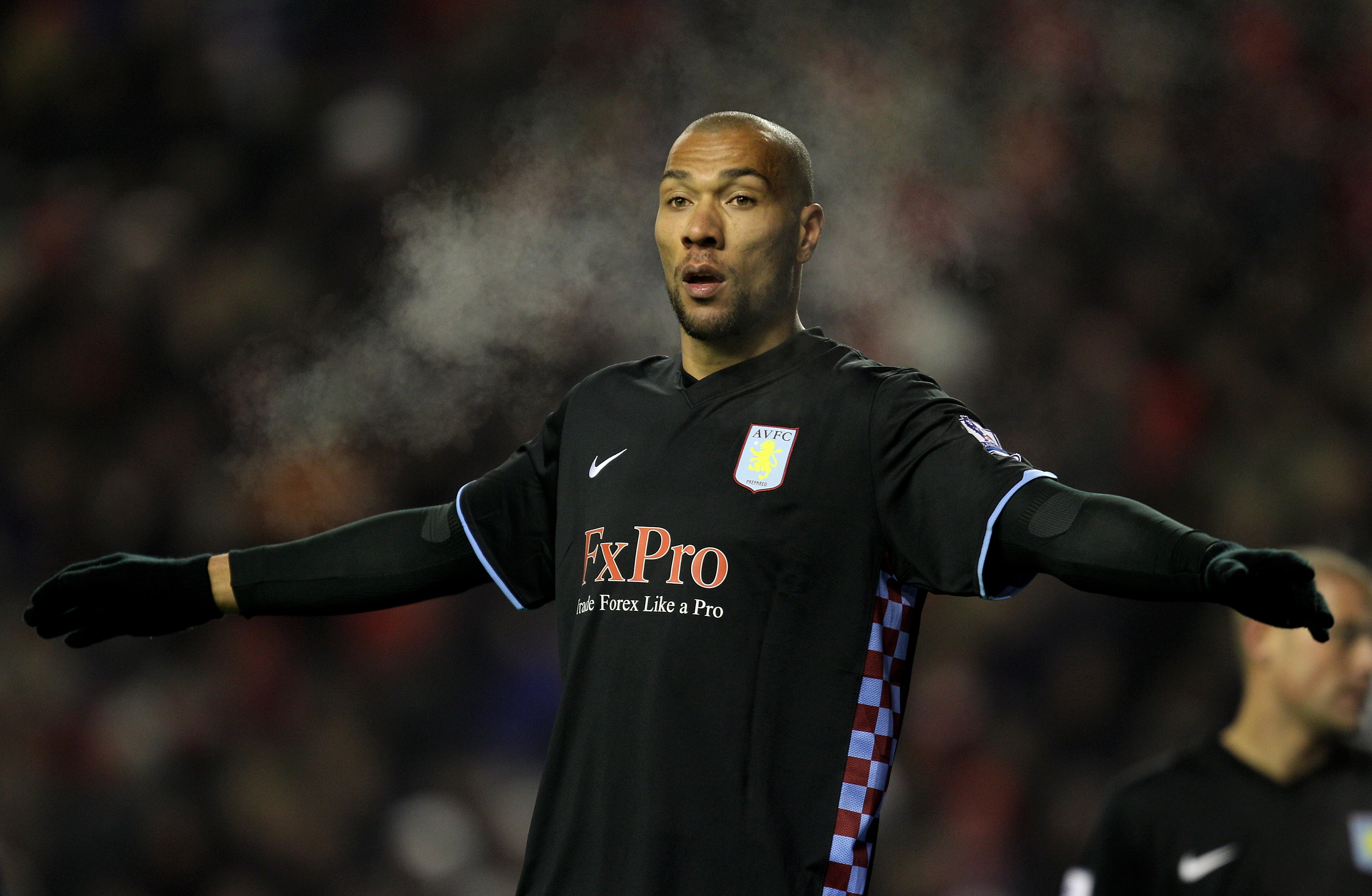 LIVERPOOL, ENGLAND - DECEMBER 06:  John Carew of Aston Villa looks on during the Barclays Premier League match between Liverpool and Aston Villa at Anfield on December 6, 2010 in Liverpool, England. (Photo by Mark Thompson/Getty Images)